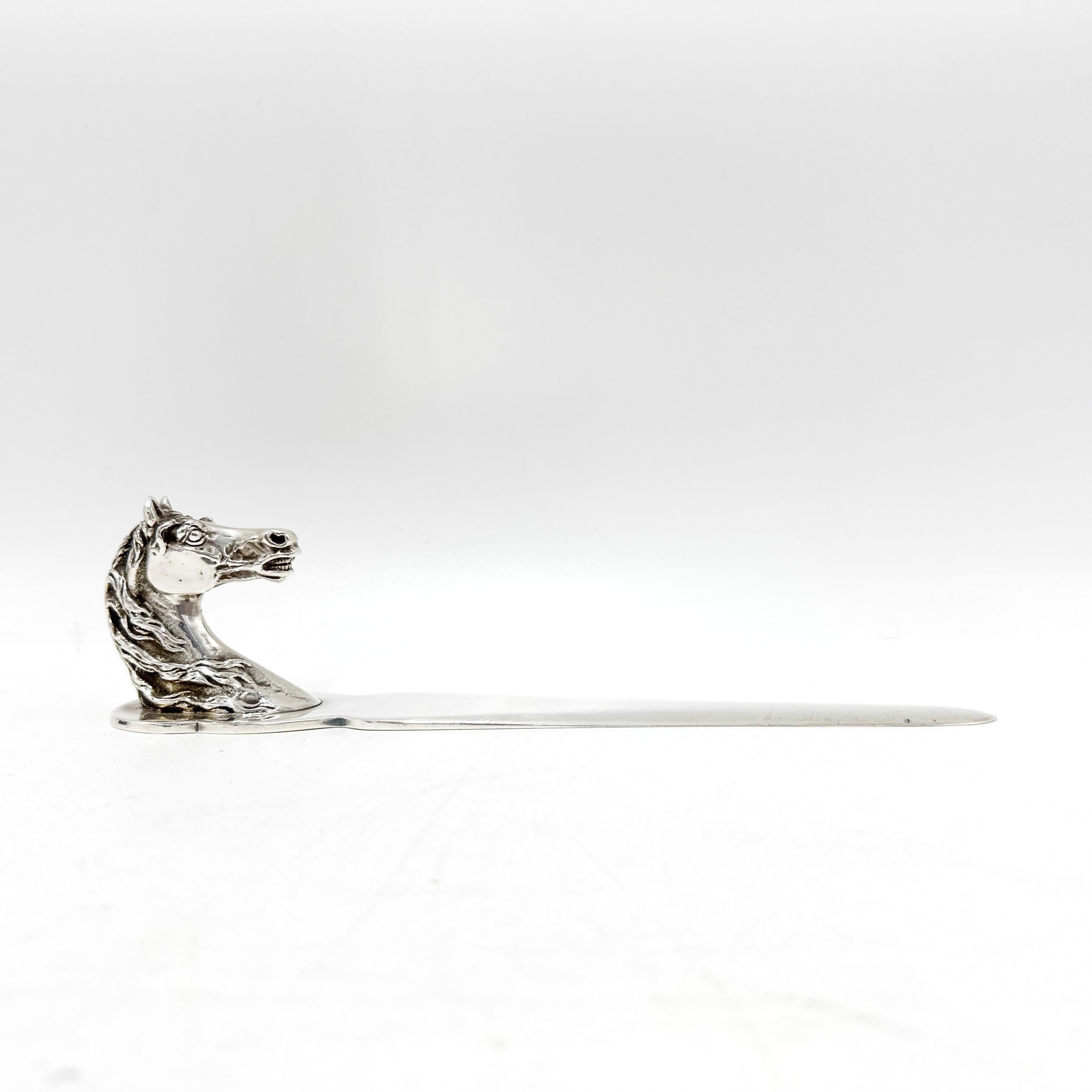 A refined desk accessory by Hermès, Paris, this vintage letter opener dates to circa 1960s and features a finely detailed horse head in profile—an homage to the maison's deep equestrian heritage. Crafted in a plated sterling silver,  the sculpted