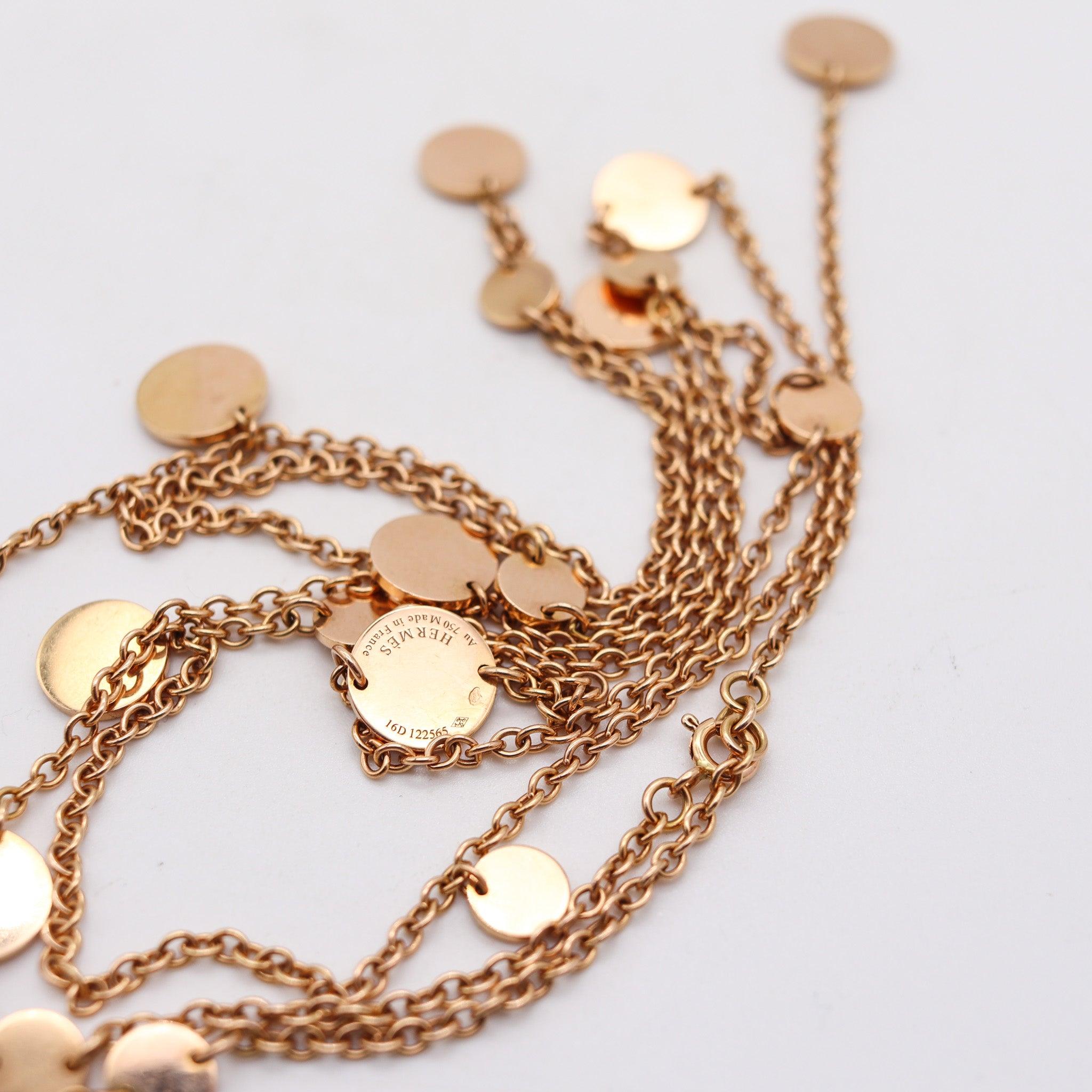 Verstellbares Collier sautoir, entworfen von Hermès Paris.

Dies ist eine prächtige Halskette sautoir in Paris Frankreich von der Luxus-Haus von Hermès, um die 1980er Jahre erstellt. Die elegante Kette wurde meisterhaft aus massivem 18-karätigem