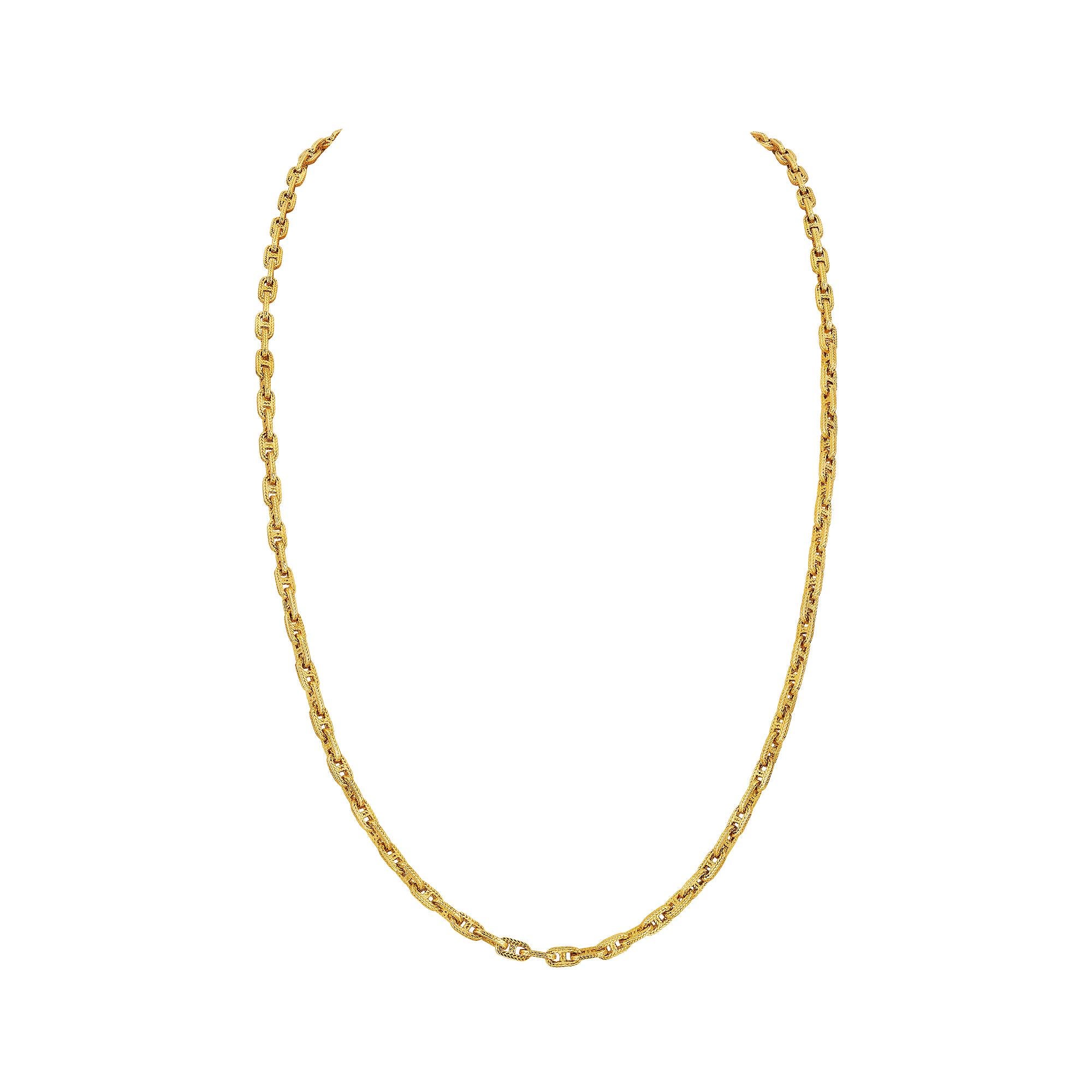 Long and lean, this rare Hermes Paris George L'Enfant vintage 'chaine d'ancre' 18 karat yellow gold link 32
