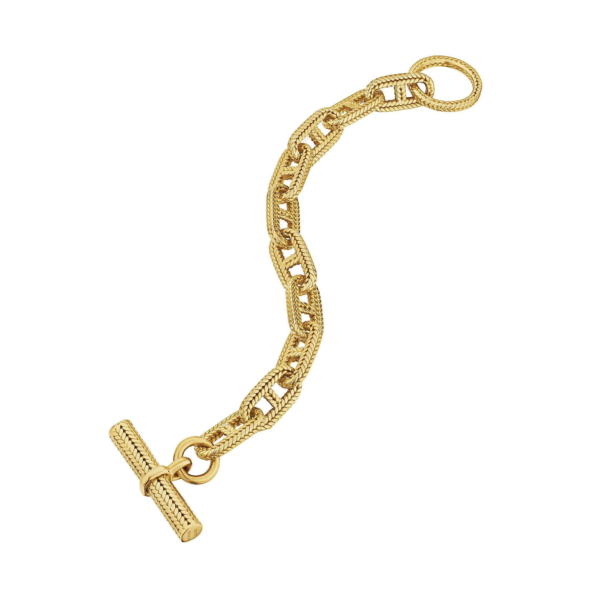 Ce bracelet Hermes Georges L'Enfant Paris 'chaine d'ancre', rare et de grande taille, est la pièce que vous recherchiez. Avec ses dix maillons fabriqués à la main, ce bracelet en or jaune 18 carats à chevrons tressés est extraordinairement