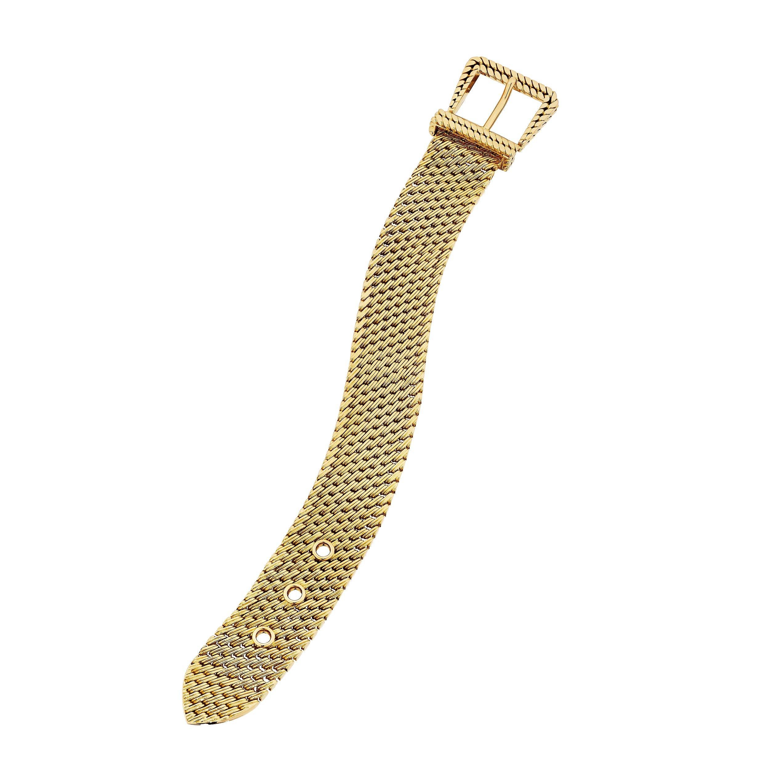Buckle up and go with this Hermes Paris Georges L'enfant vintage gold buckle bracelet.  With a handsome all over woven pattern, this rare jewel is both stylish and collectible.  Signed Hermes Paris with Georges L'enfant hallmark.  Circa 1980-85.  9