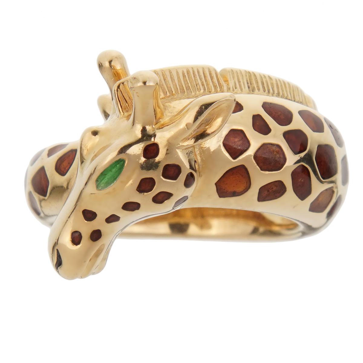 A chic Hermes enamel ring showcasing a Giraffe motif set in 18k yellow gold with brown enamel spots.

Size 5 3/4