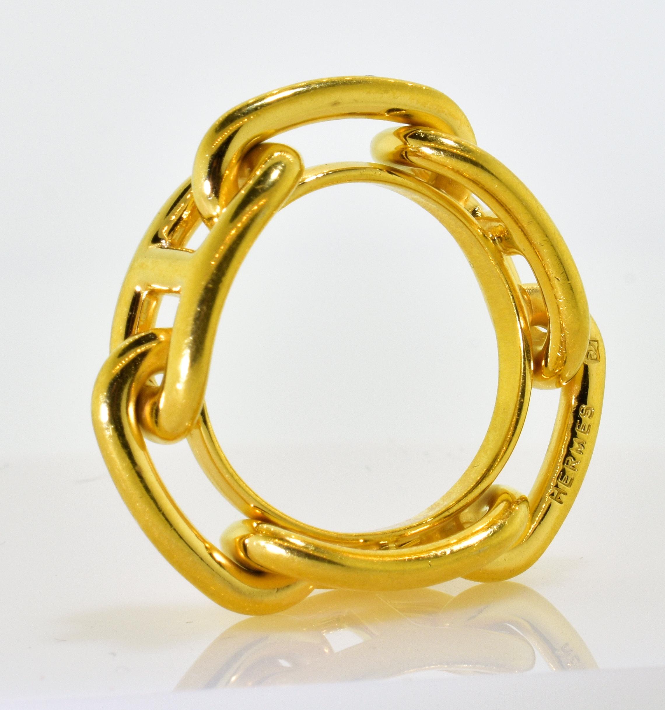 Hermes Paris high yellow gold color ring or scarf ring.  Known for their classic equestrian motifs for all their items, this ring is one that is not seen often.  It can be worn as a finger ring (Size 8), or as a scarf ring.  In high yellow gold