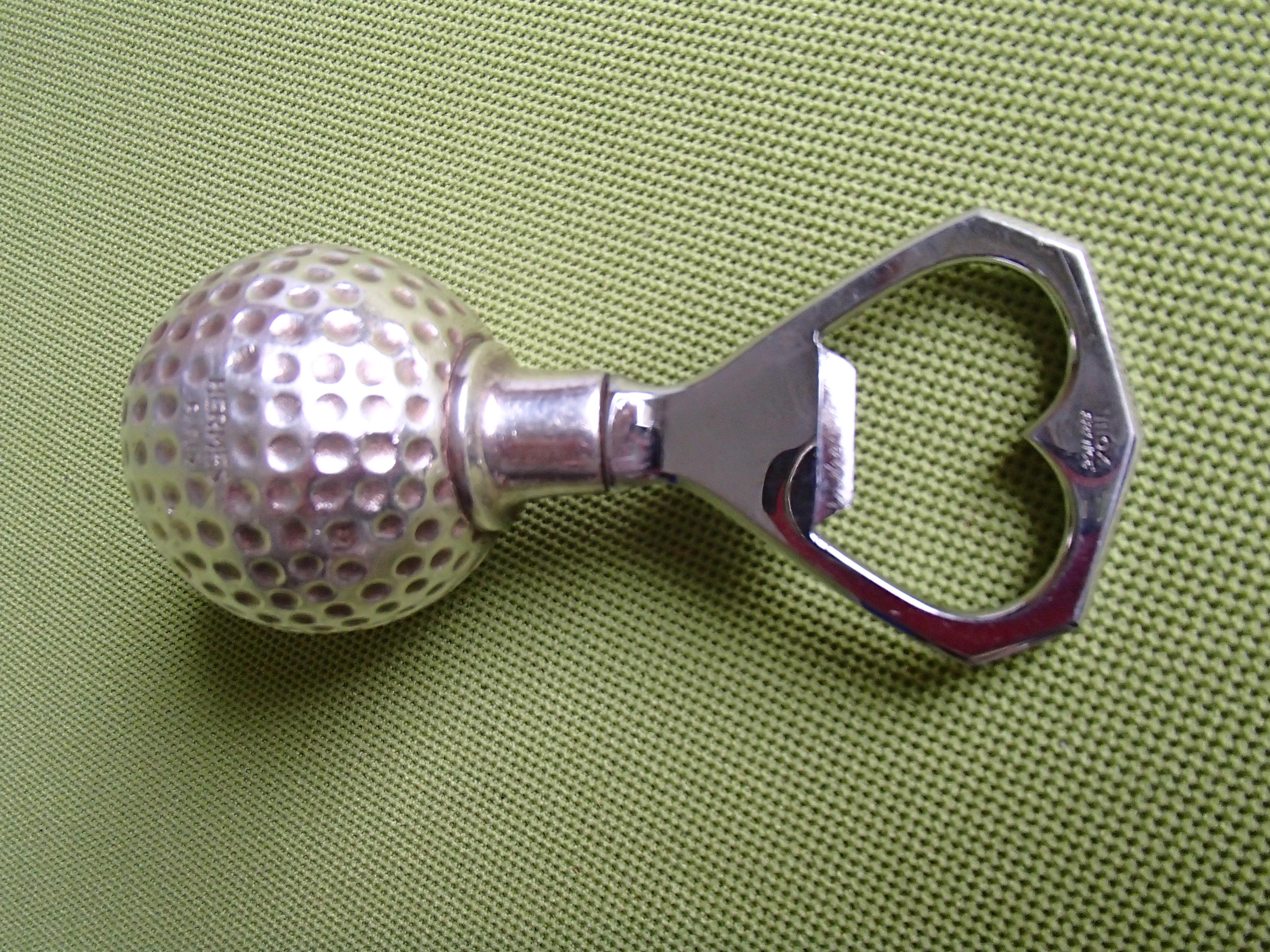 Hermes Paris Golfball-Flaschenöffner.