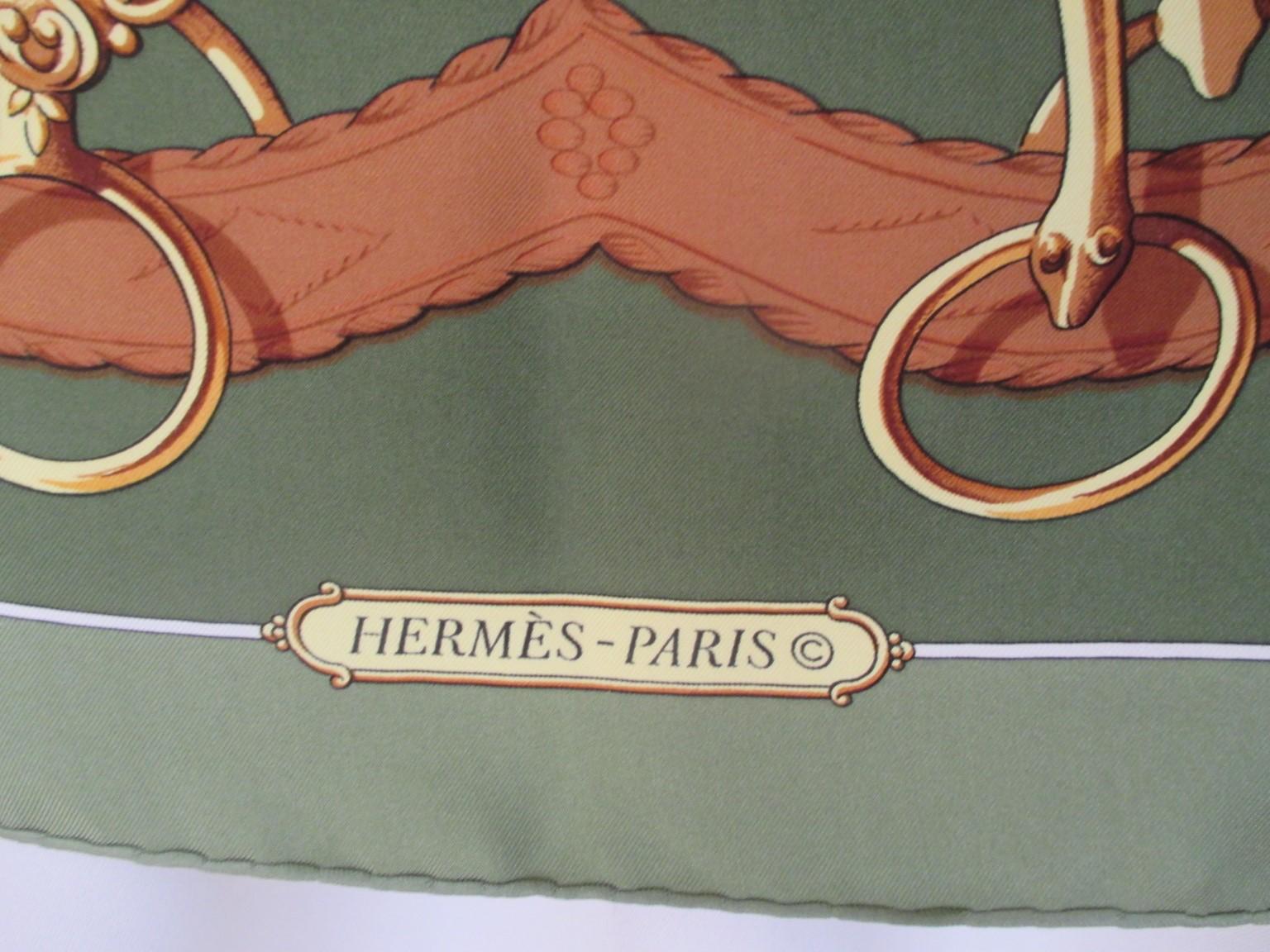 Hermes Vintage green gold brown Silk Twill Scarf.
This Hermes scarf is a true collector's silk scarf in collector's condition, one to own to wear, show or frame. 
The perfect colorway to accessorize your spring and summer wardrobes. 
Made in France.