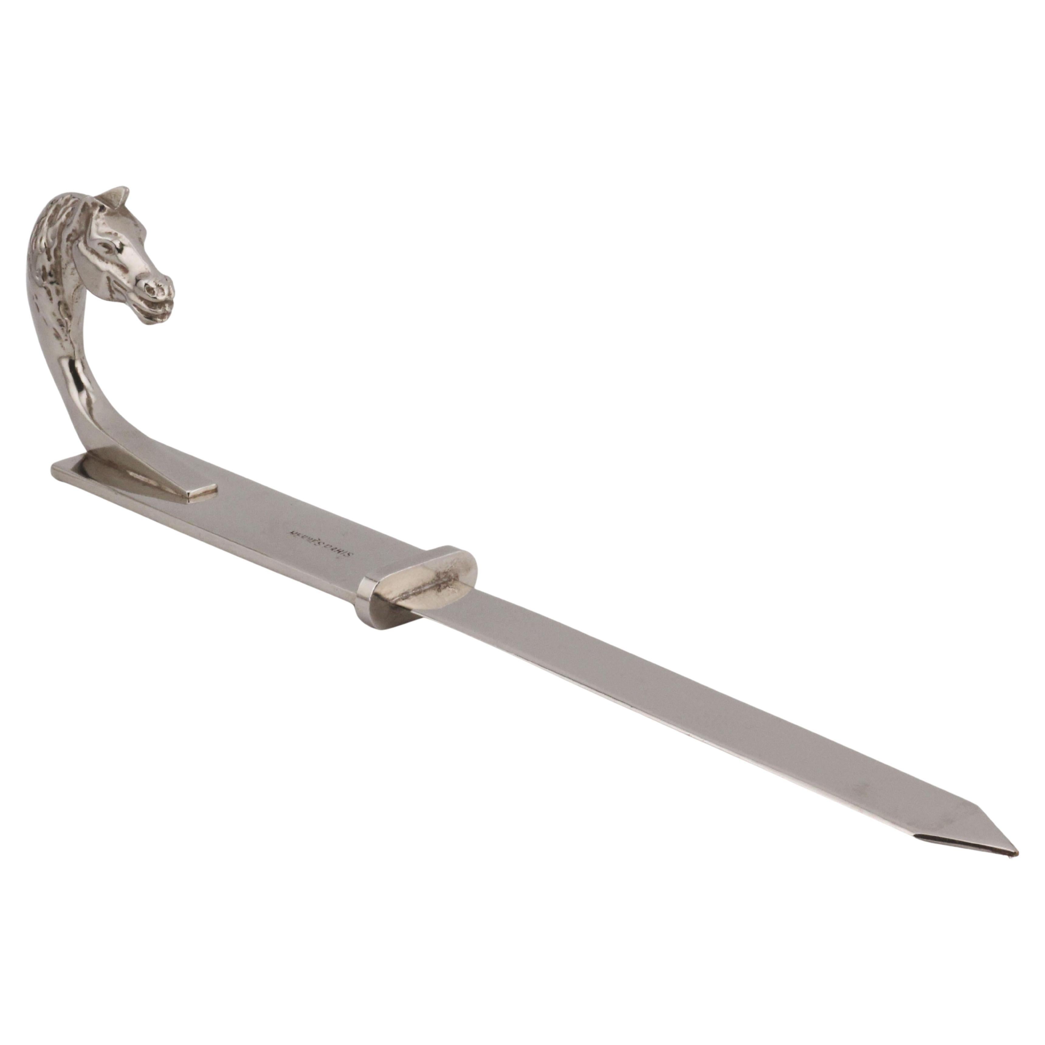 Tagliacarte in argento con motivo a cavallo di Hermes Paris