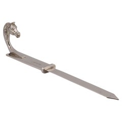Tagliacarte in argento con motivo a cavallo di Hermes Paris