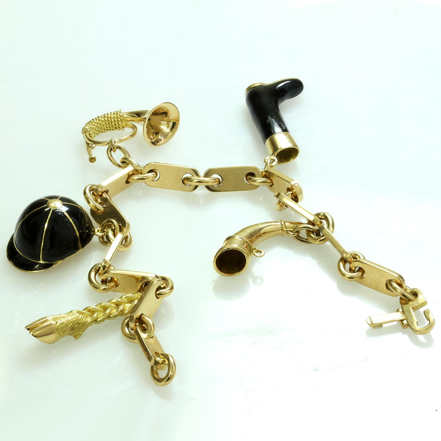 Women's or Men's Hermes Paris Horse Rider Black Enamel Yellow Gold Charm Bracelet For Sale