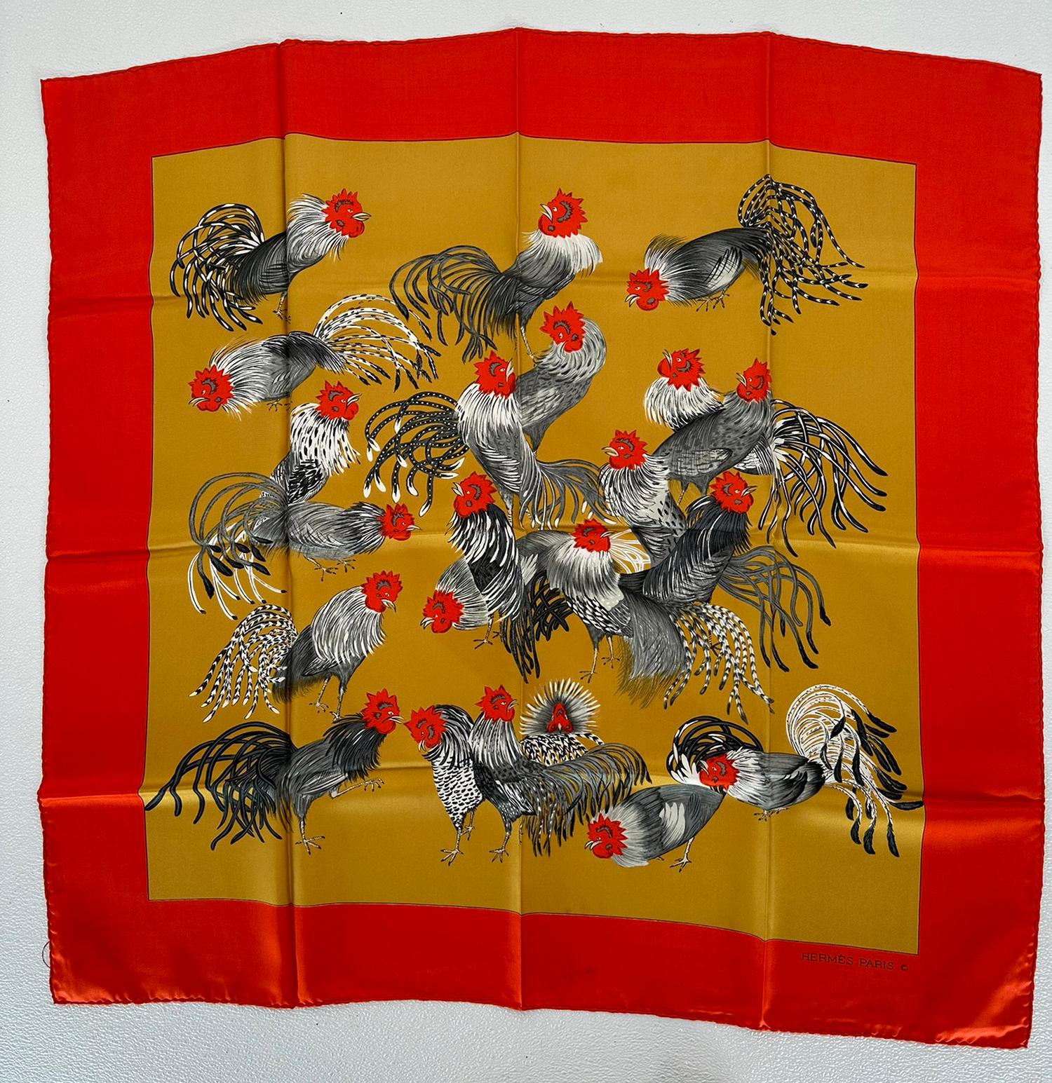 Hermes Paris Jeunes Coqs Vintage Silk Twill Scarf Designed Madame La Torre 1966, with only one edition, which makes this scarf quite rare. This in gold with a bright orange border was carefully stored it is crisp with full hems. There are two faint