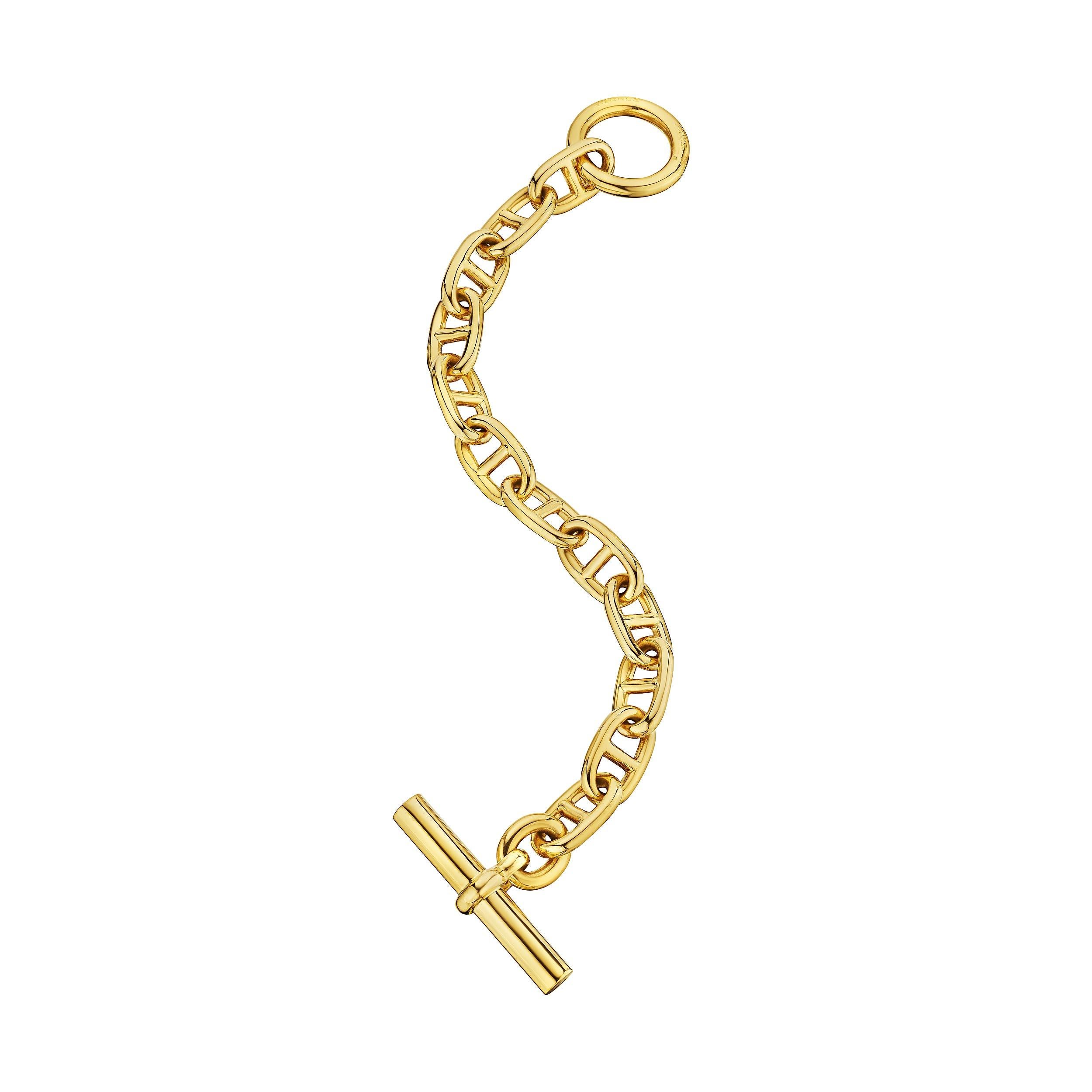 Bold and uncompromising this Hermes Paris modernist 'chaine d'ancre' toggle medium link bracelet is the statement piece you have been searching for. With 12 links, this polished 18 karat yellow gold bracelet is extraordinarily collectible and