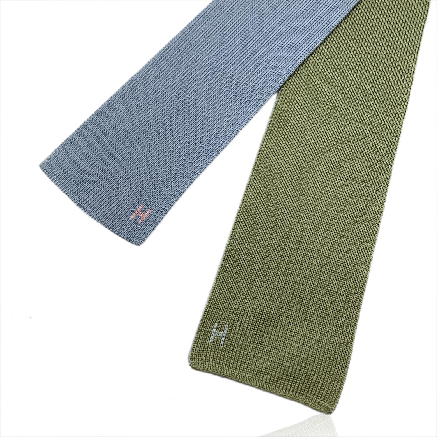 Elegant Hermes 'Maille de Soie 4 Temps' Neck Tie in pastel color. Four colors (Light Blue, Light Pink, Green and Aqua Green) for a 4-in-1 tie Composition: 100% Silk. Hermes composition tag attached. Made in Italy. Total length:57 inches - 144.7 cm.