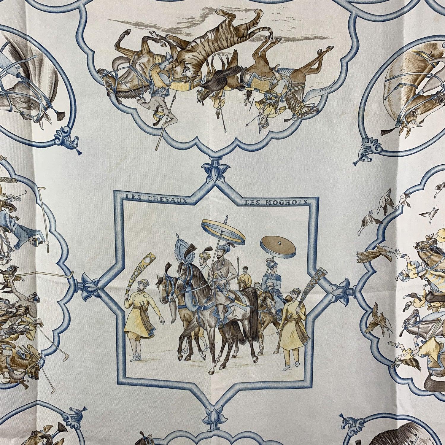 Hermes Paris Silk Scarf 'Les Chevaux de Moghols'. It depicts Mongol horsemen chaperoning their Emperor across the steppes of Central Asia. Artist : Jean De Fougerolle. Year(s) of issue: 1993, 1997/98, 2000, 2005, 2006. The 'HERMES Paris' is located