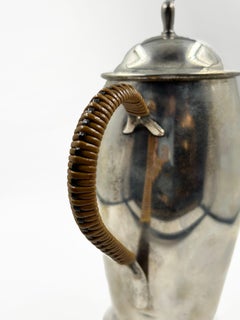 Hermès Paris silver teapot with rattan handle, France, mid-20th century