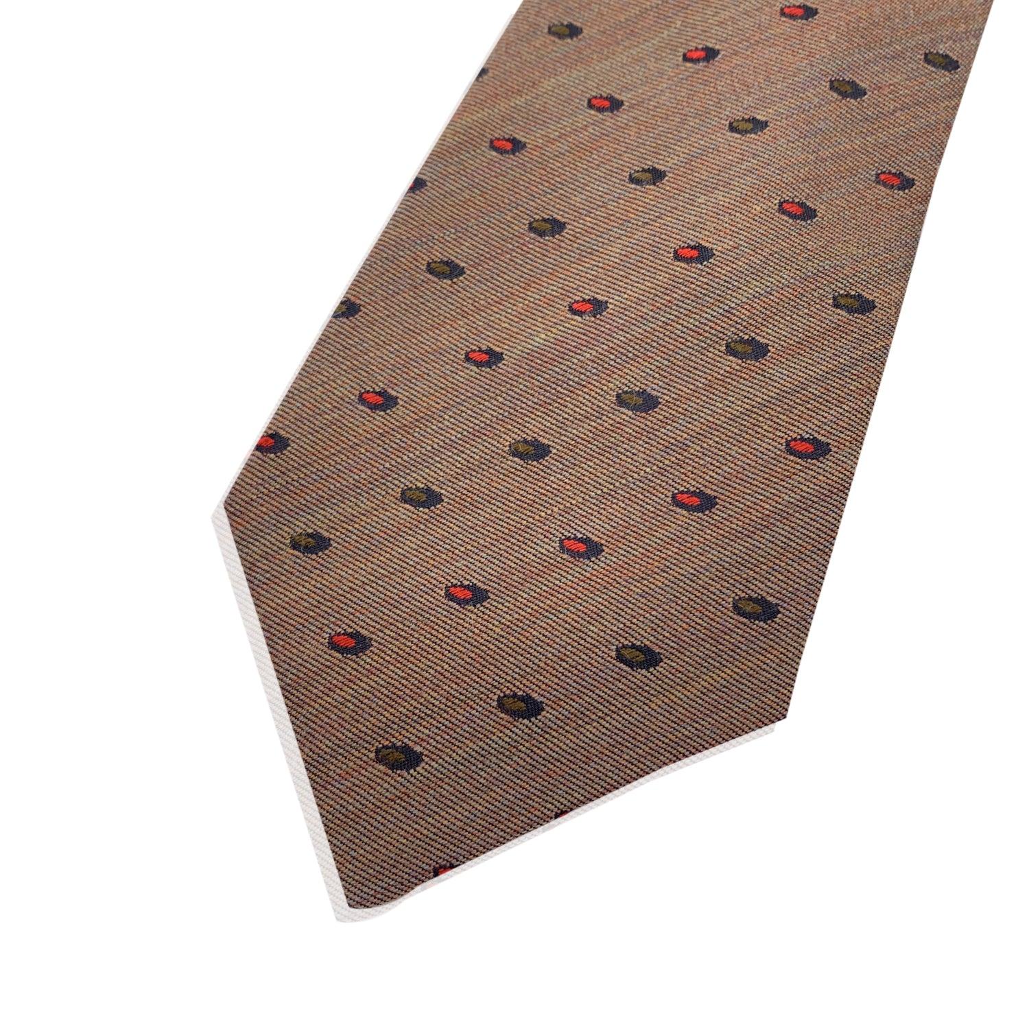 Elegant Hermes Neck Tie in brown color. Composition: 60% Silk, 40% Wool. Hermes composition tag attached. Made in France. Total length: 55 inches - 139.5 cm. Max width: 3.5 inches - 8.9 cm Details MATERIAL: Wool COLOR: Brown MODEL: - GENDER: