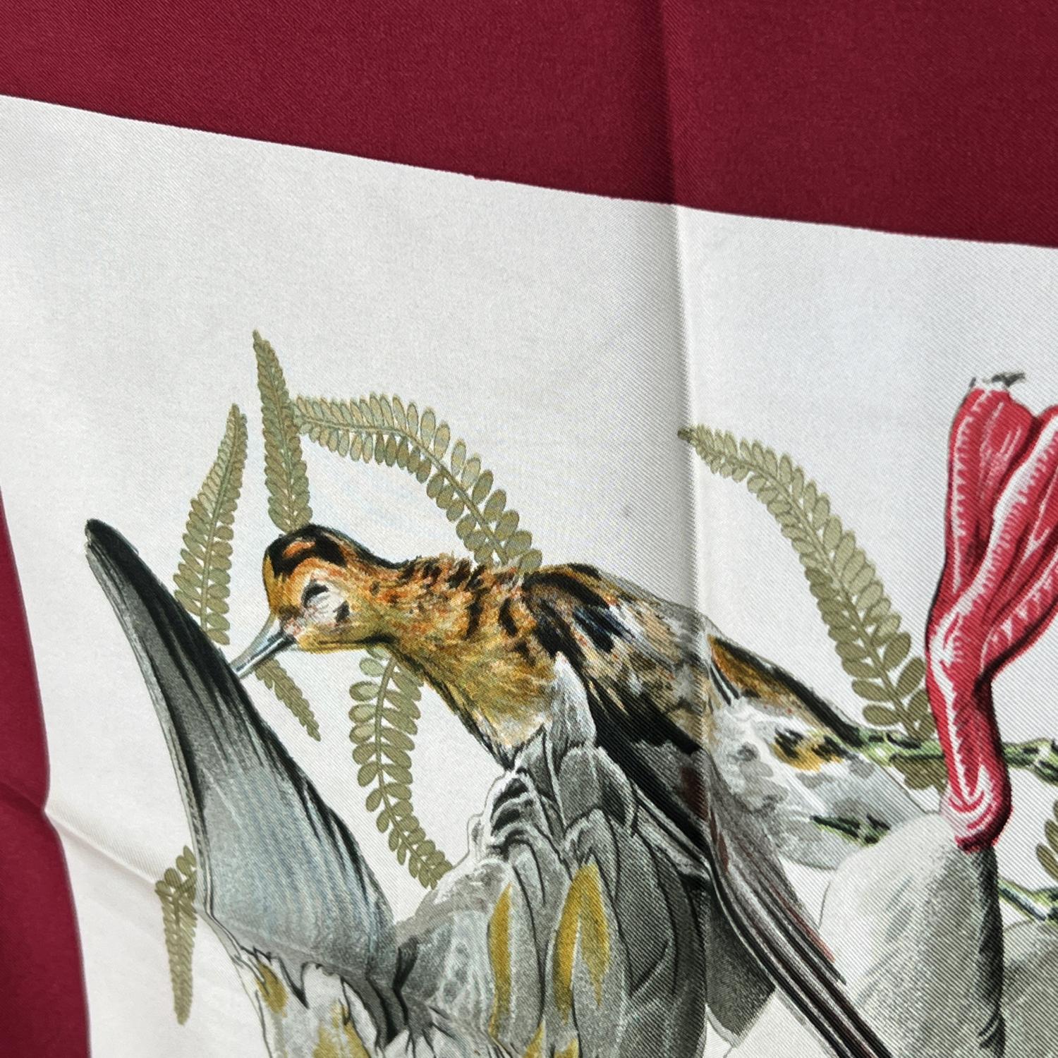 HERMES vintage gorgeous 'GIBIERS' print pure silk scarf. Designed by HENRI DE LINARES and first issued in 1966. Burgundy borders. Opulent design of pheasants, rabbit, and hunting game green background. Hand rolled edges. Made in France. Composition: