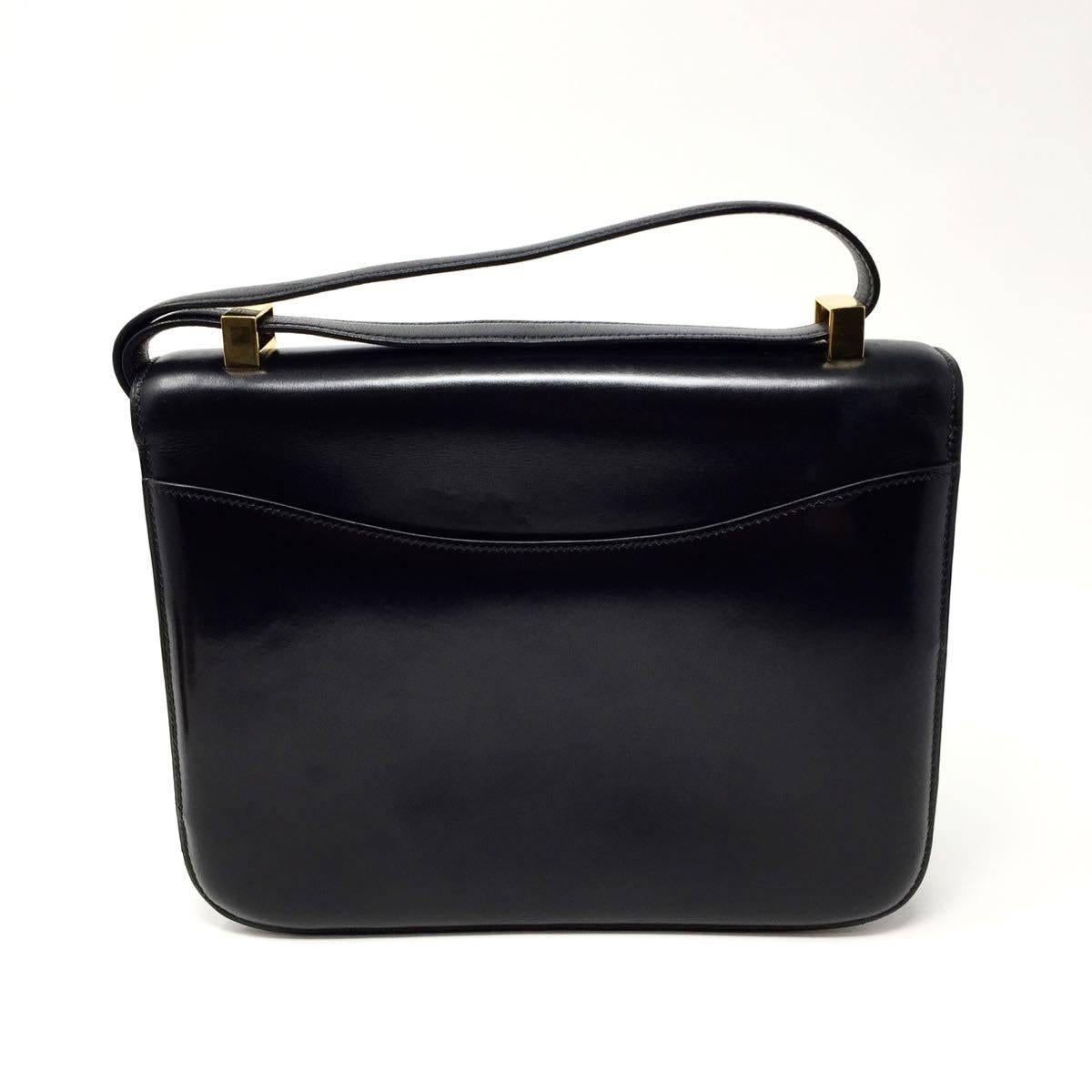Women's or Men's Hermes Paris Vintage Black Box Leather Constance Bag, 1976