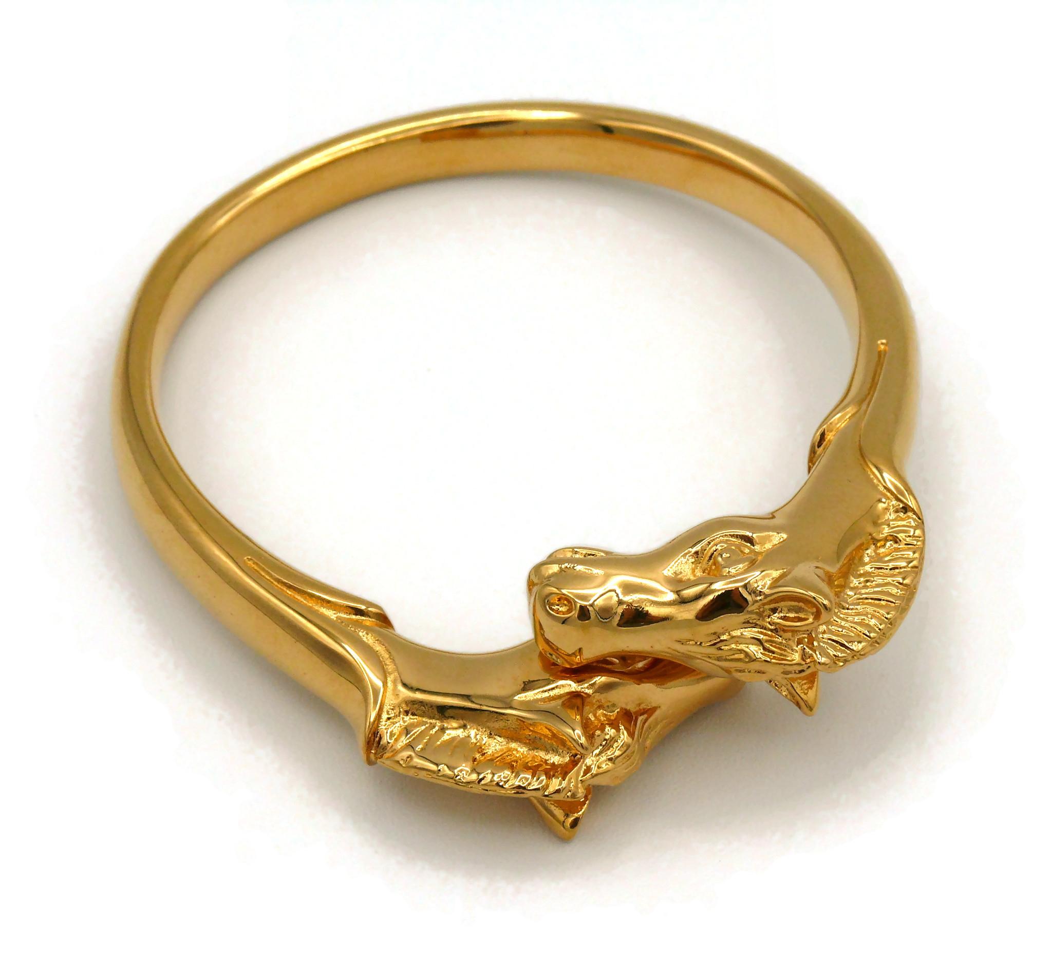 Women's Hermes Paris Vintage Gold Toned Double Horse Head Bangle Bracelet For Sale
