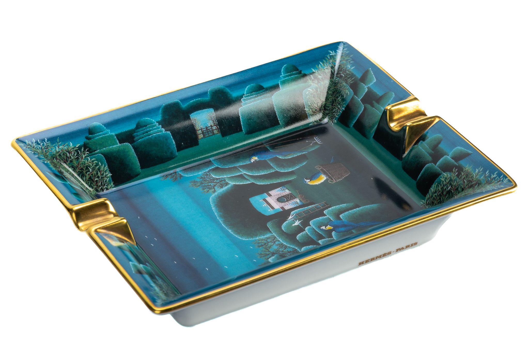 Hermes light blue, dark blue and green porcelain ashtray with parrots in the night design