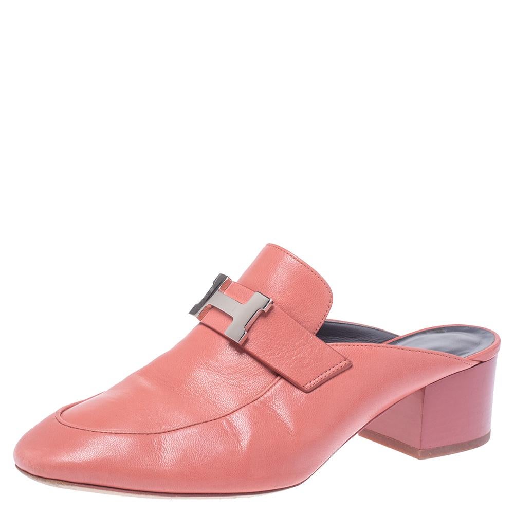Mules are a coveted style and we can see why. They are super comfortable, classy, and can work all day without any hassle, just like these Hermes ones. They are crafted from pink leather and feature round toes, signature H detailing, and block