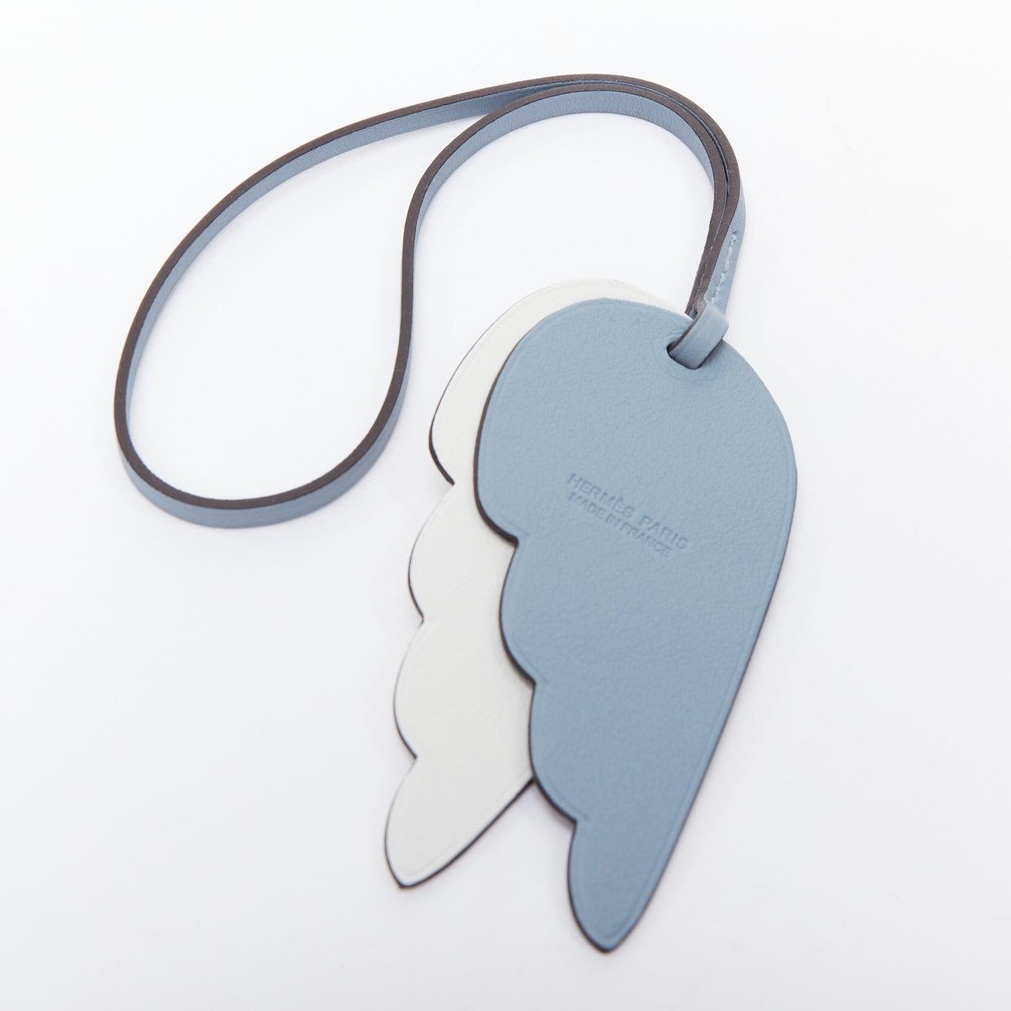 HERMES Pegasus blue white wing leather bag charm
Reference: NKLL/A00380
Brand: Hermes
Model: Pegasus
Material: Leather
Color: Blue, White
Pattern: Solid
Closure: Strap
Made in: France

CONDITION:
Condition: Excellent, this item was pre-owned and is