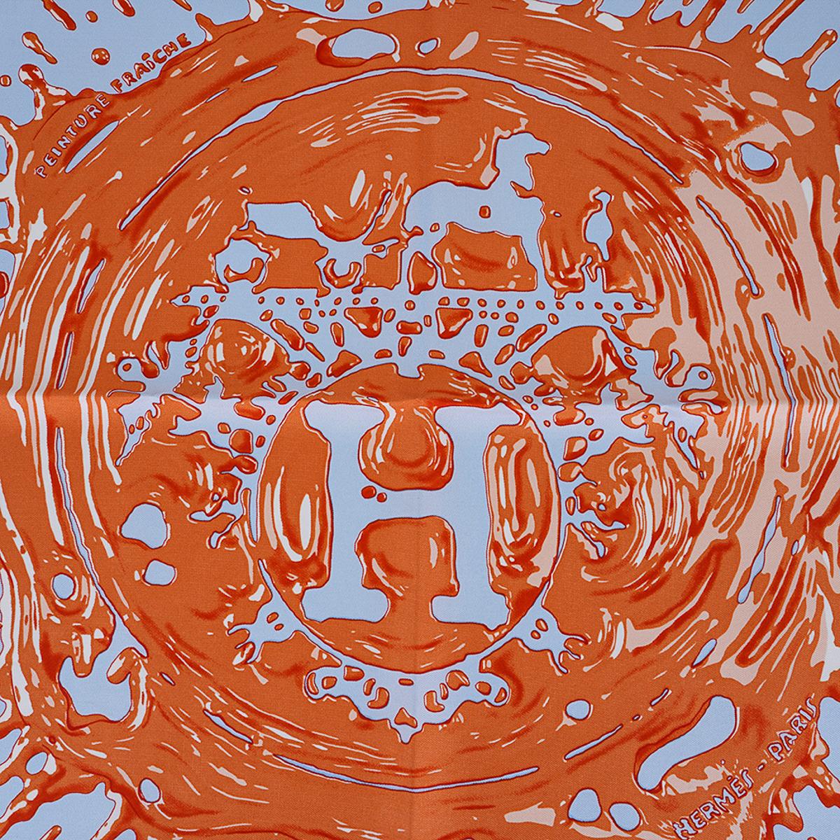 Mightychic offers an Hermes Peinture Fraiche scarf featured in Bleu Ciel and Abricot colorway.
Designed by Dimitri Rybaltchenko this pocket square depicts the iconic ex-libris 