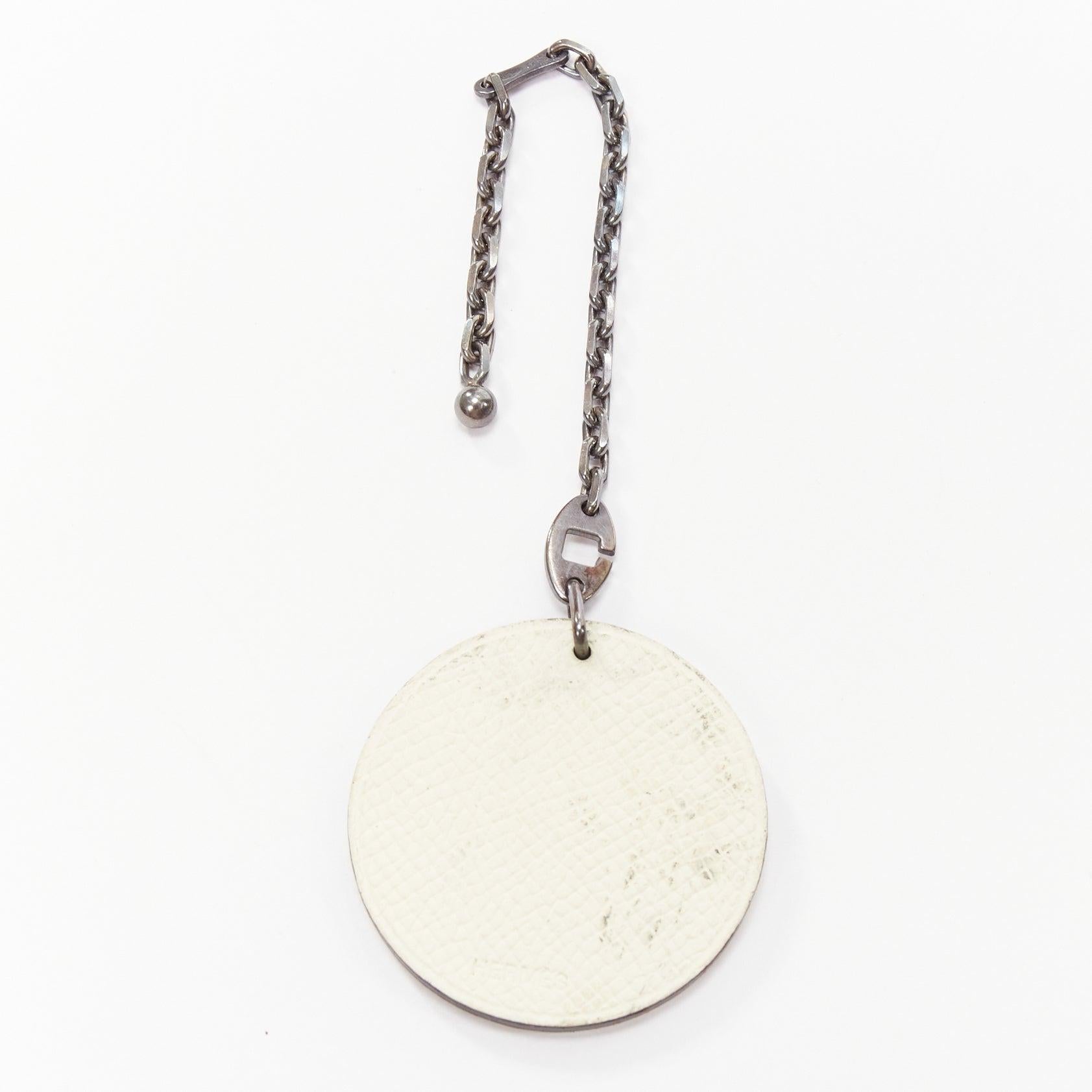 HERMES Penguin white leather black coin ruthenium bag charm
Reference: AAWC/A01030
Brand: Hermes
Material: Leather, Metal
Color: Multicolour, White
Pattern: Cartoon
Extra Details: Discreet logo back.

CONDITION:
Condition: Poor, this item was