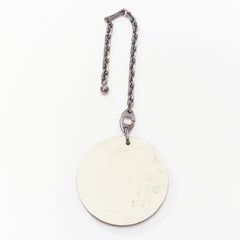 HERMES Penguin white leather black coin ruthenium bag charm