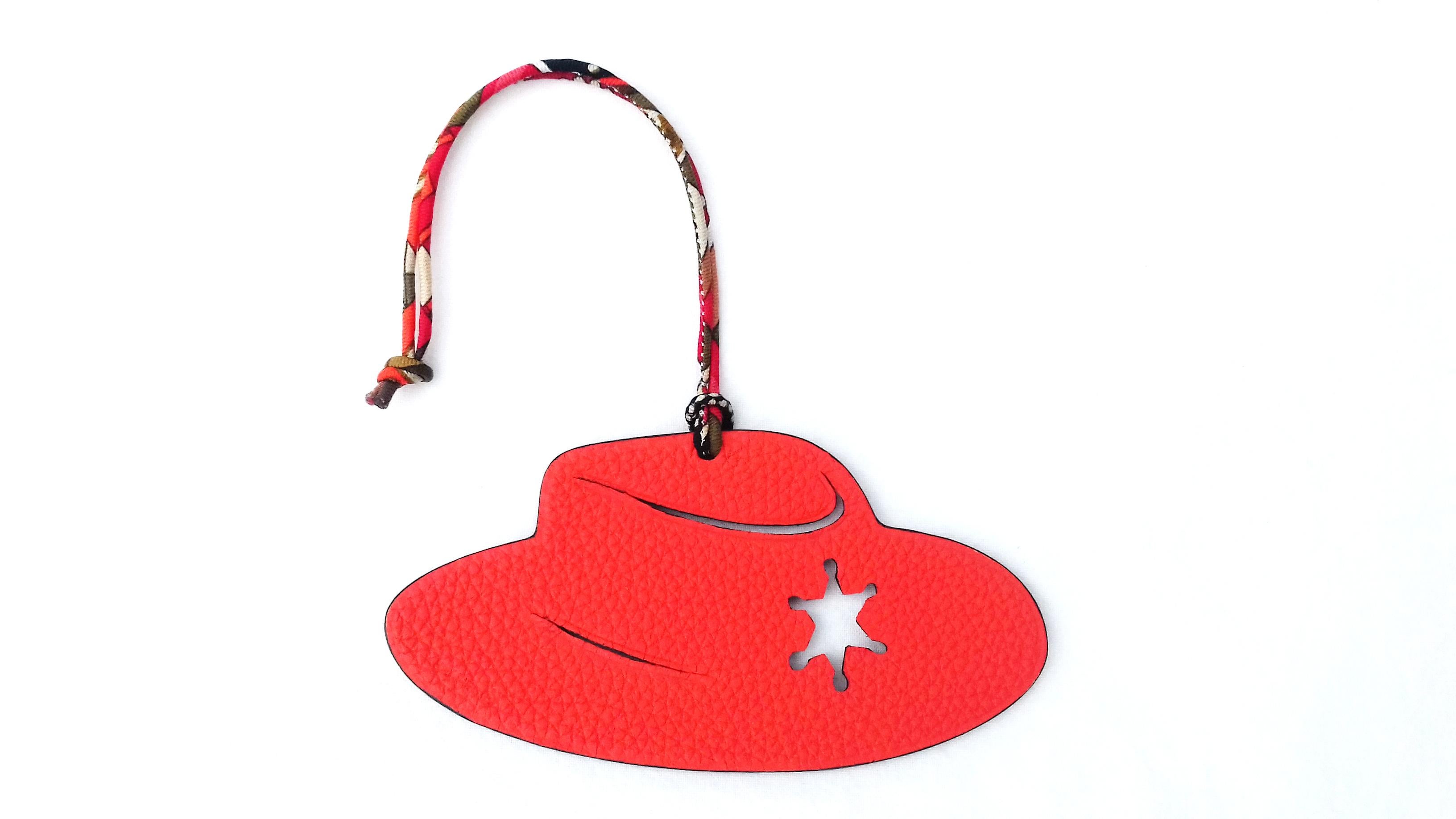 Super Rare Authentic Hermès Charm

Pattern: Sheriff Hat

Can be used as Bag Charm for your Hermès Kelly or Birkin Bag

The Pink side is made of Epsom Leather, the Orange side is made of Granied Leather

Colorways: Rose Confetti, Orange

Can be hung