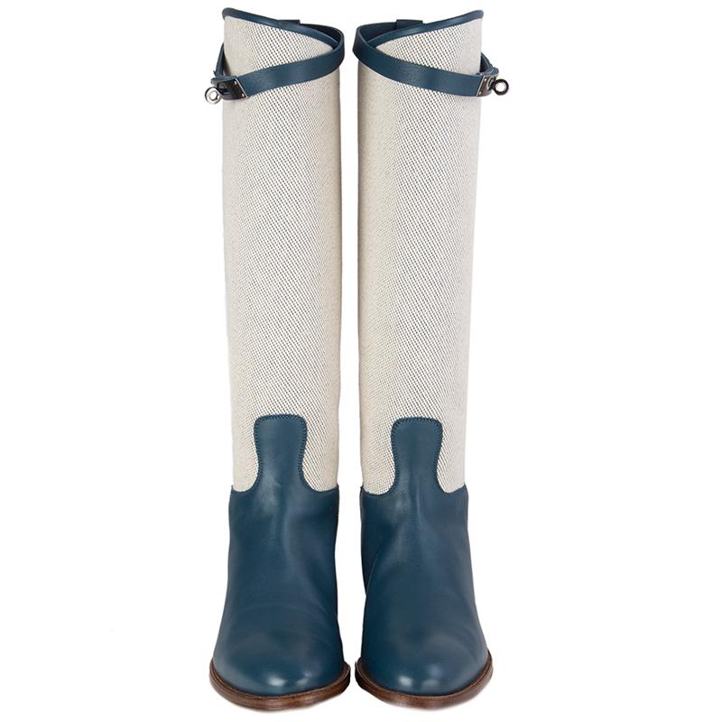  100% authentic Hermès 'Jumping Limited Edition' Boots in cobalt blue (petrol) box leather and oatmeal Toile H fabric. Brand new. Come with box and dust bag.

Measurements
Imprinted Size	40
Shoe Size	40
Inside Sole	27cm (10.5in)
Width	7.5cm