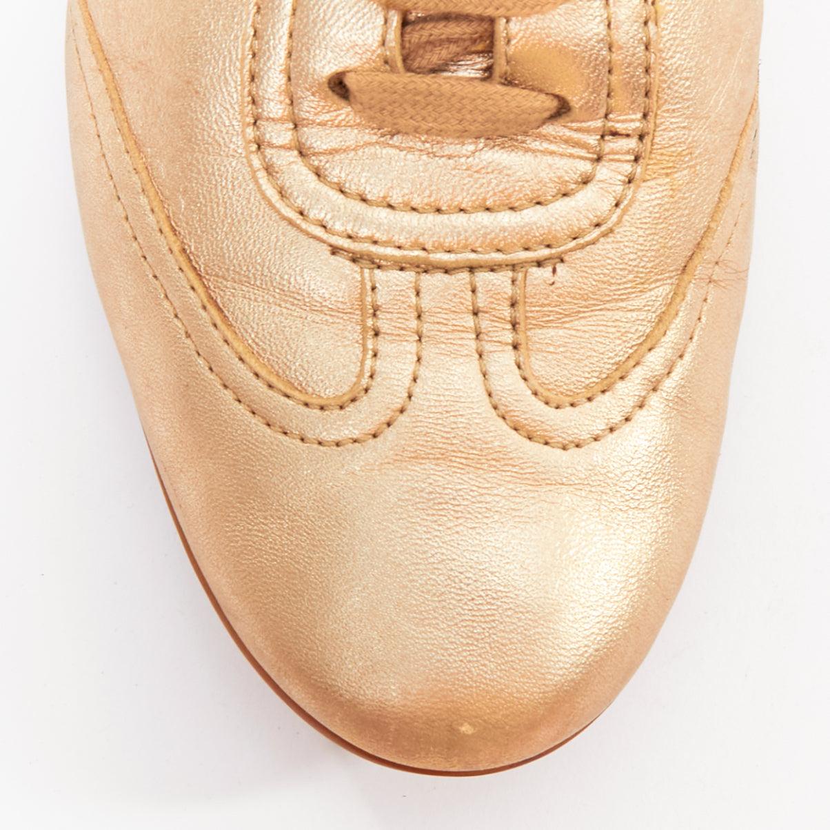 HERMES Pewter gold metallic perforated H leather laced flat sneakers EU37 im Angebot 1