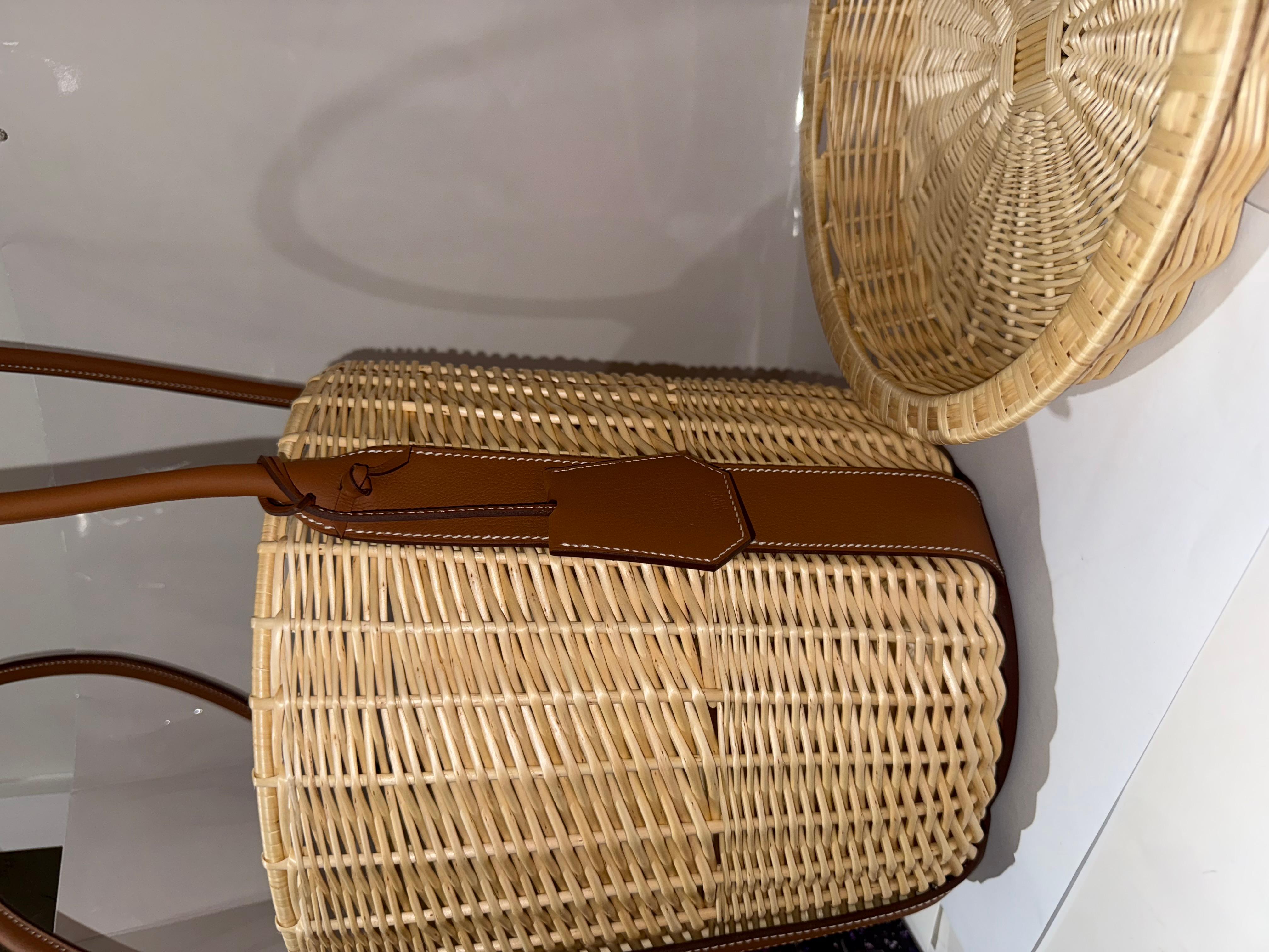 Hermes Park Soleil d'Hermès picnic basket in Brown Wicker and smooth taurillon leather, for luxury lifestyle. Hand braided wicker ( Osier ) accentuated with smooth Taurillon leather.

The basket is part of the picnic set of picnic plates and glasses
