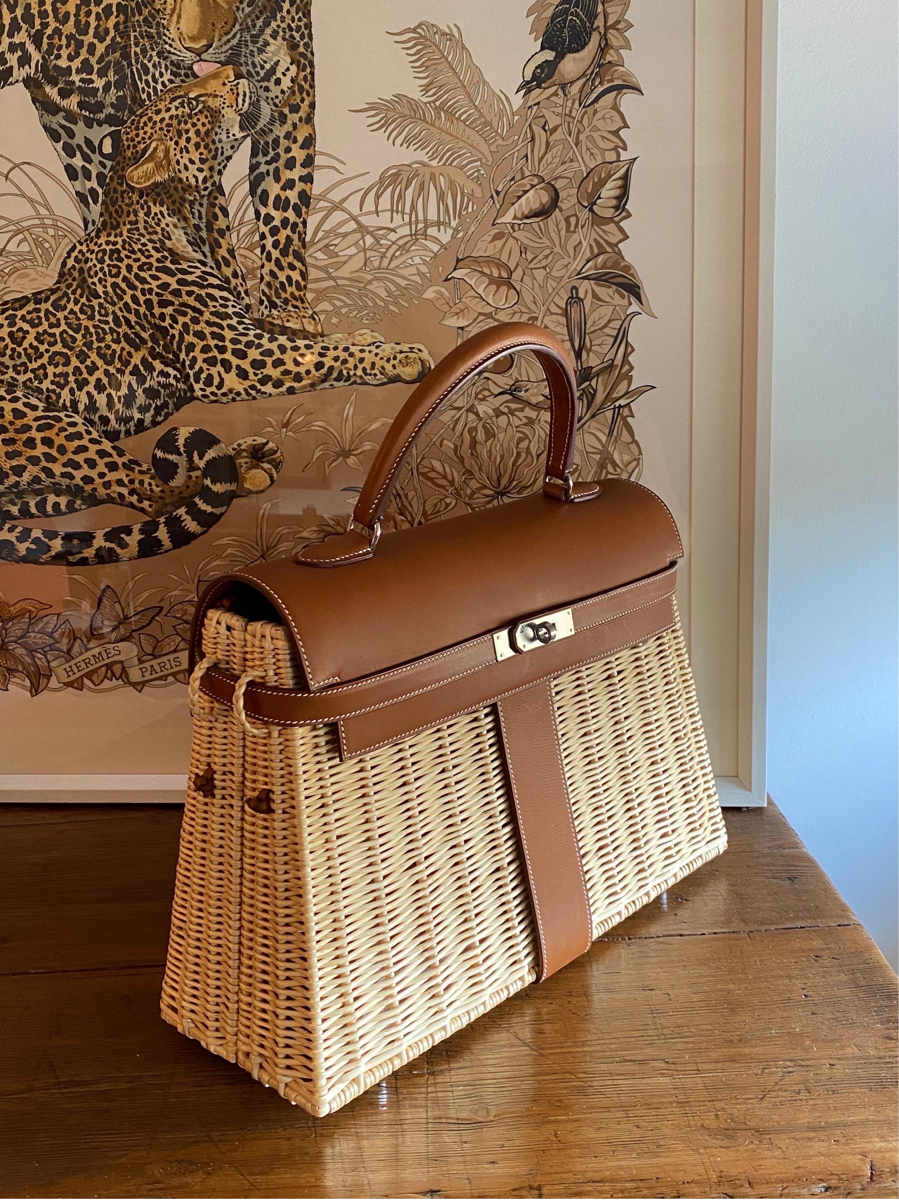 Hermes Picnic Kelly bag.

Crafted in France, this extremely rare and highly sought bag is a true testament to the quality of the house's craftsmanship, exuding timeless style and elegance. 35cm in size, this unique piece features a distinctive