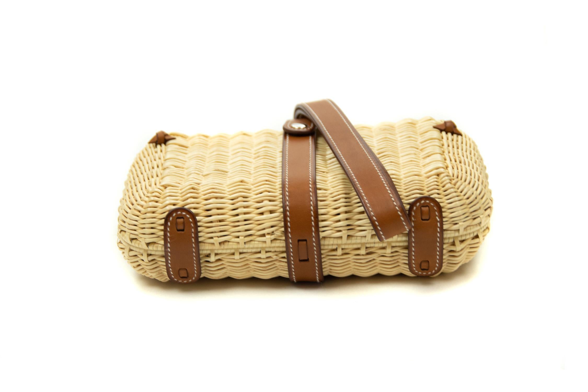 Hermes Picnic Minaudiere Wicker Clutch in Barenia Leather. This iconic special order Hermes clutch is timeless and chic. Fresh and crisp with palladium hardware.

    Condition: New or Never Used
    Made in France
    Bag Measures: 7.5