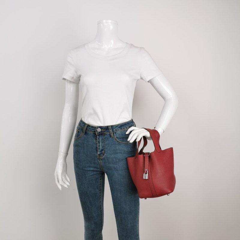 Hermes Picotin 18 Burgundy Clemence Taurillon Leather 2014
 These are professional photos of the actual bag offered by Luxbags.
 The Hermes Picotin 18 Red is a nod to the equestrian world, inspired by the shape of feeder bags. This bag celebrates