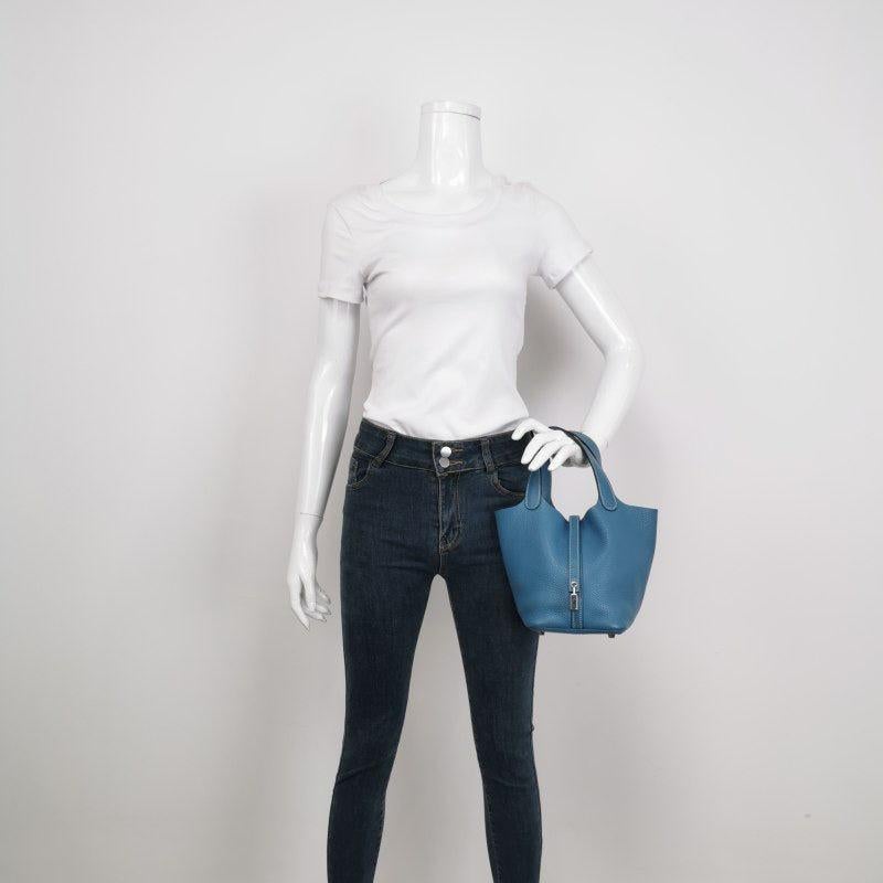Hermes Picotin 18 Clemence Taurillon Leather Blue Jean 2015
These are professional photos of the actual bag.
  The Hermes Picotin is a nod to the equestrian world, inspired by the shape of feeder bags. This bag celebrates simplicity and serves as a