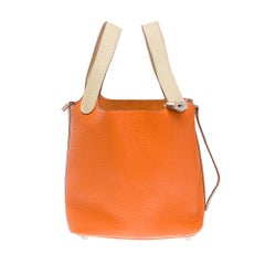 Hermès Picotin 18 lock in Orange and Parchemin Taurillon leather , PHW