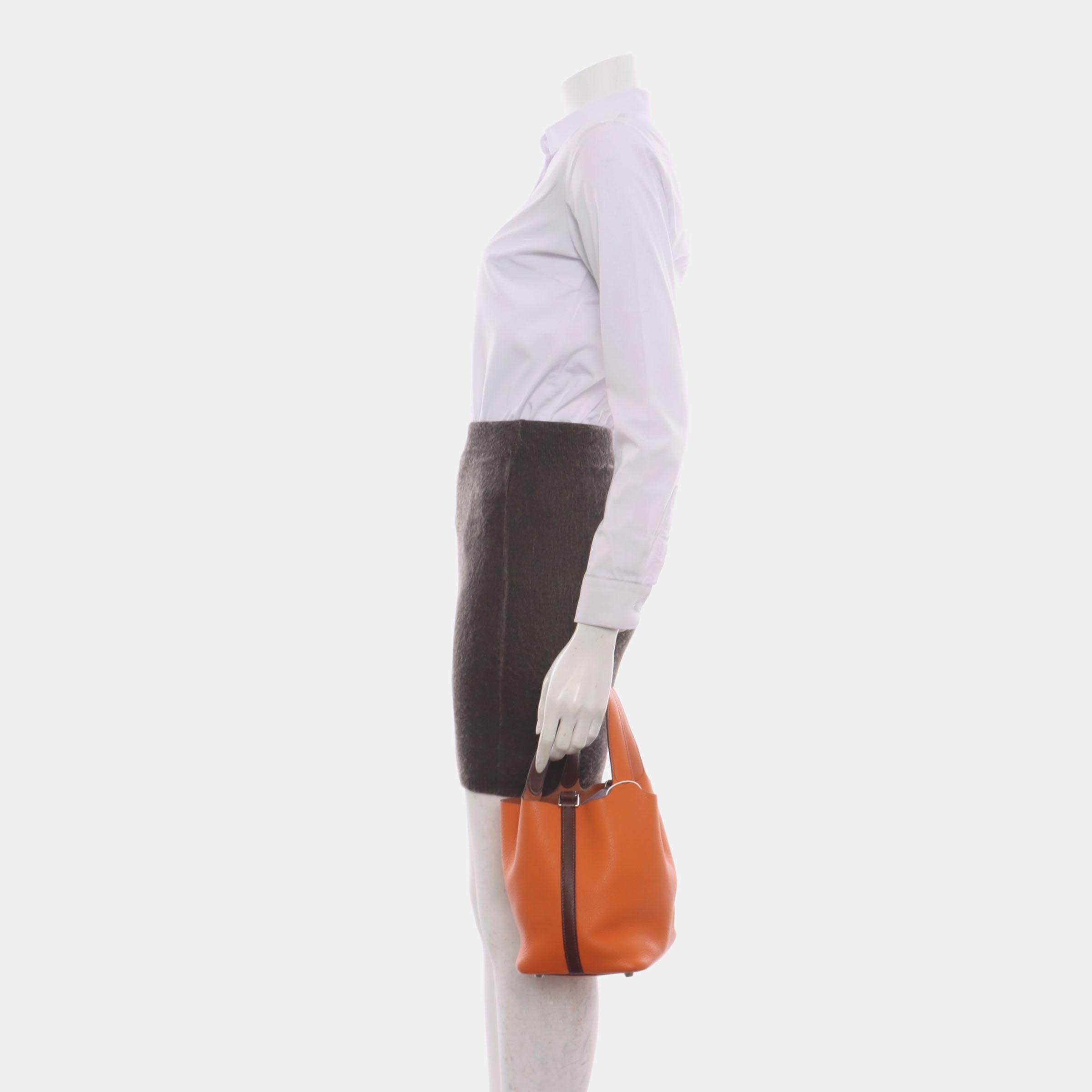 The Hermes Picotin 18 is a nod to the equestrian world, inspired by the shape of feeder bags. This bag celebrates simplicity and serves as a carefree companion for the wearer. Its distinctive design and functionality make it a must-have for any