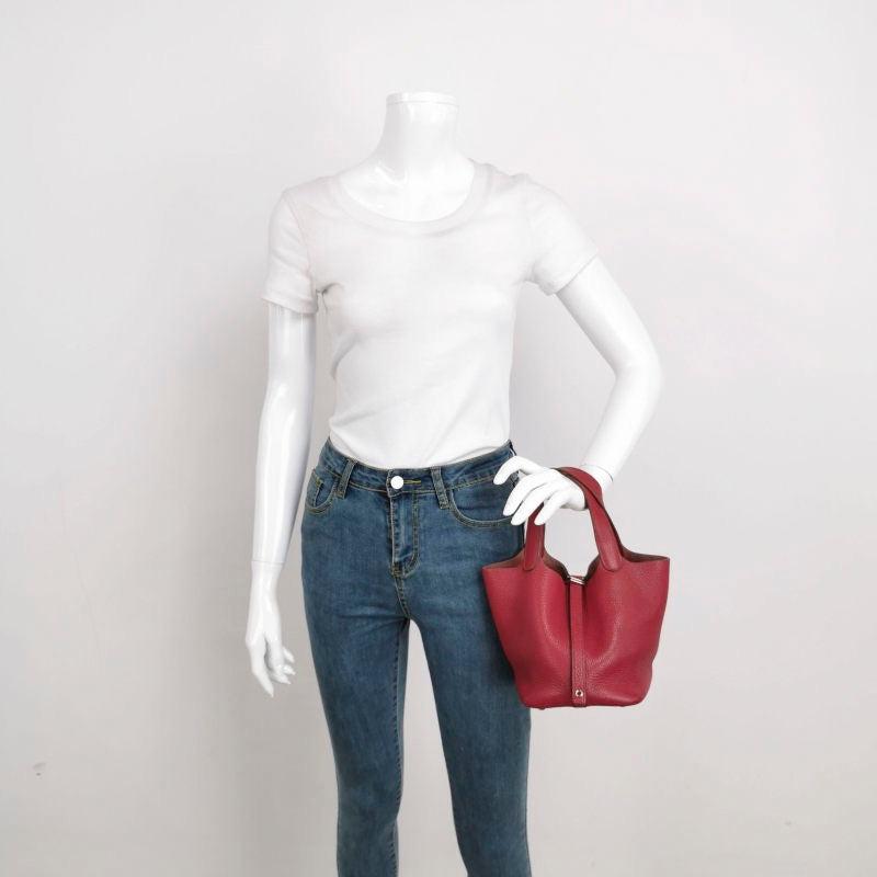 Hermes Picotin 18 Red Clemence Taurillon Leather 2014
These are professional photos of the actual bag.
  The Hermes Picotin 18 Red is a nod to the equestrian world, inspired by the shape of feeder bags. This bag celebrates simplicity and serves as a