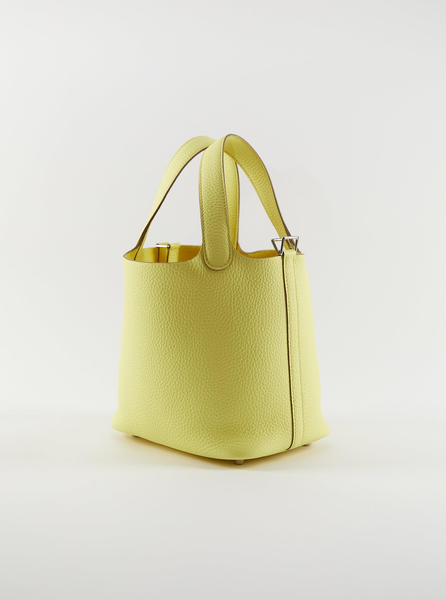 Hermès Picotin 18cm in Limoncello

Clemence Leather with Palladium Hardware

U Stamp / 2023

Accompanied by: Copy receipt, Hermes box, Hermes dustbag, lock, keys, care card and ribbon

Measurements: 7