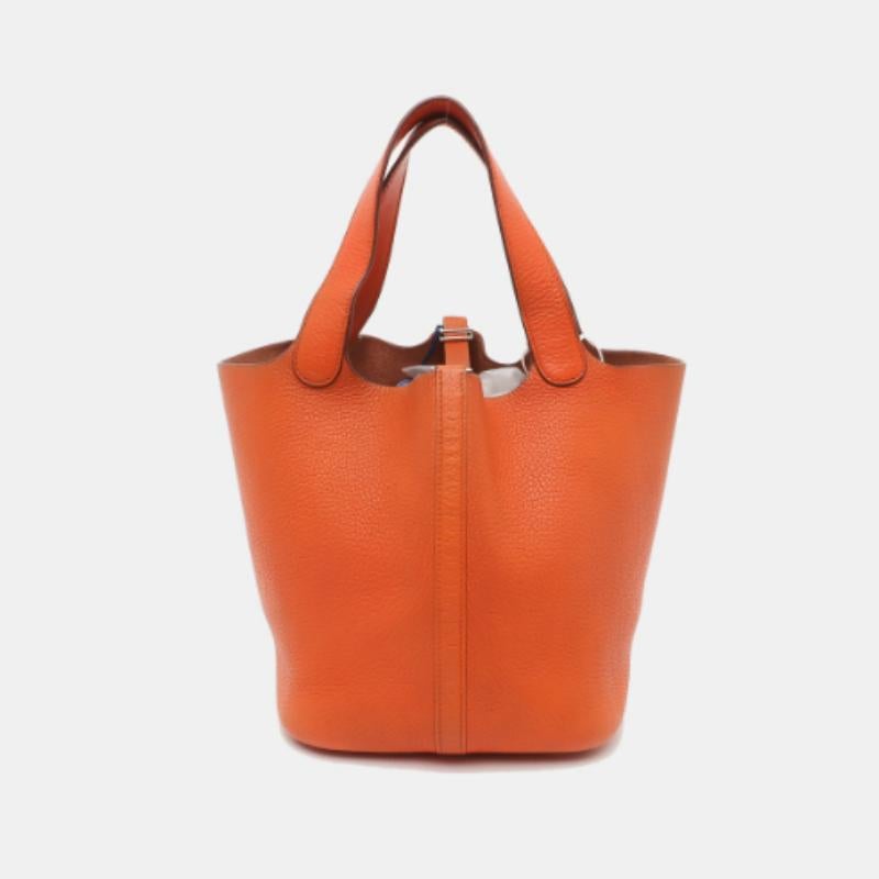 Hermes Picotin 22 Orange Clemence Taurillon Leather 2009
 These are professional photos of the actual bag.
 The Hermes Picotin is a nod to the equestrian world, inspired by the shape of feeder bags. This bag celebrates simplicity and serves as a
