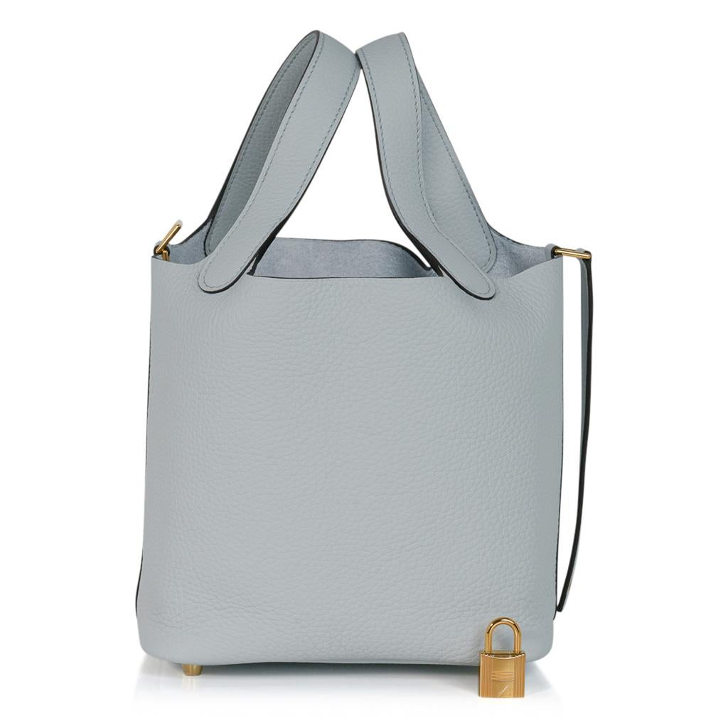 Guaranteed authentic Hermes Picotin Lock 18 tote bag featured in Blue Pale.
Clemence leather with palladium hardware.
This roomy small tote is a perfect go to bag! 
Comes with lock and keys, sleeper, and signature Hermes box.
NEW or NEVER WORN
final