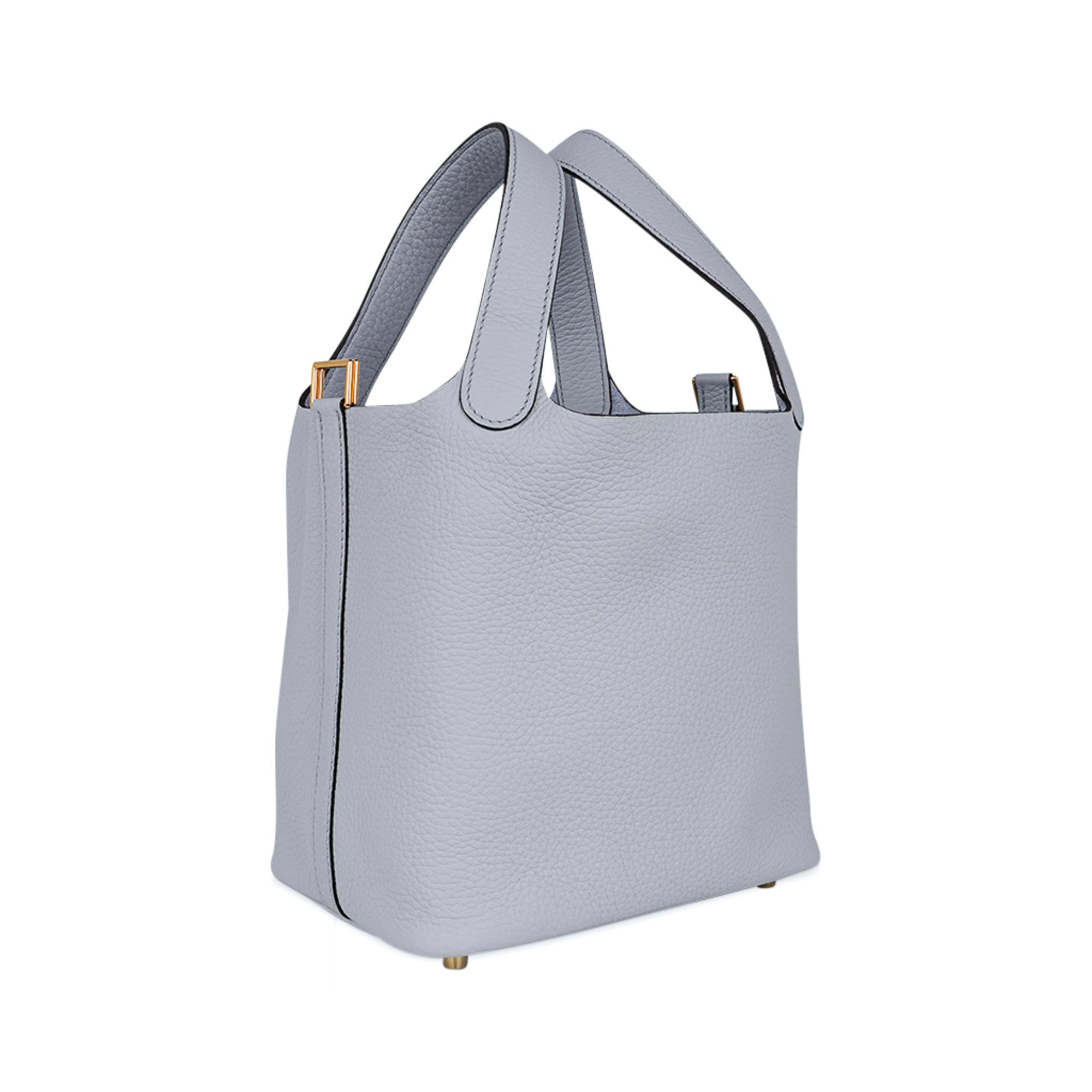 MIghtychic offers an Hermes Picotin Lock 18 tote bag featured in Blue Pale.
Clemence leather with gold hardware.
This roomy small tote is a perfect go to bag! 
Comes with lock and keys, sleeper, and signature Hermes box.
NEW or NEVER WORN.
final