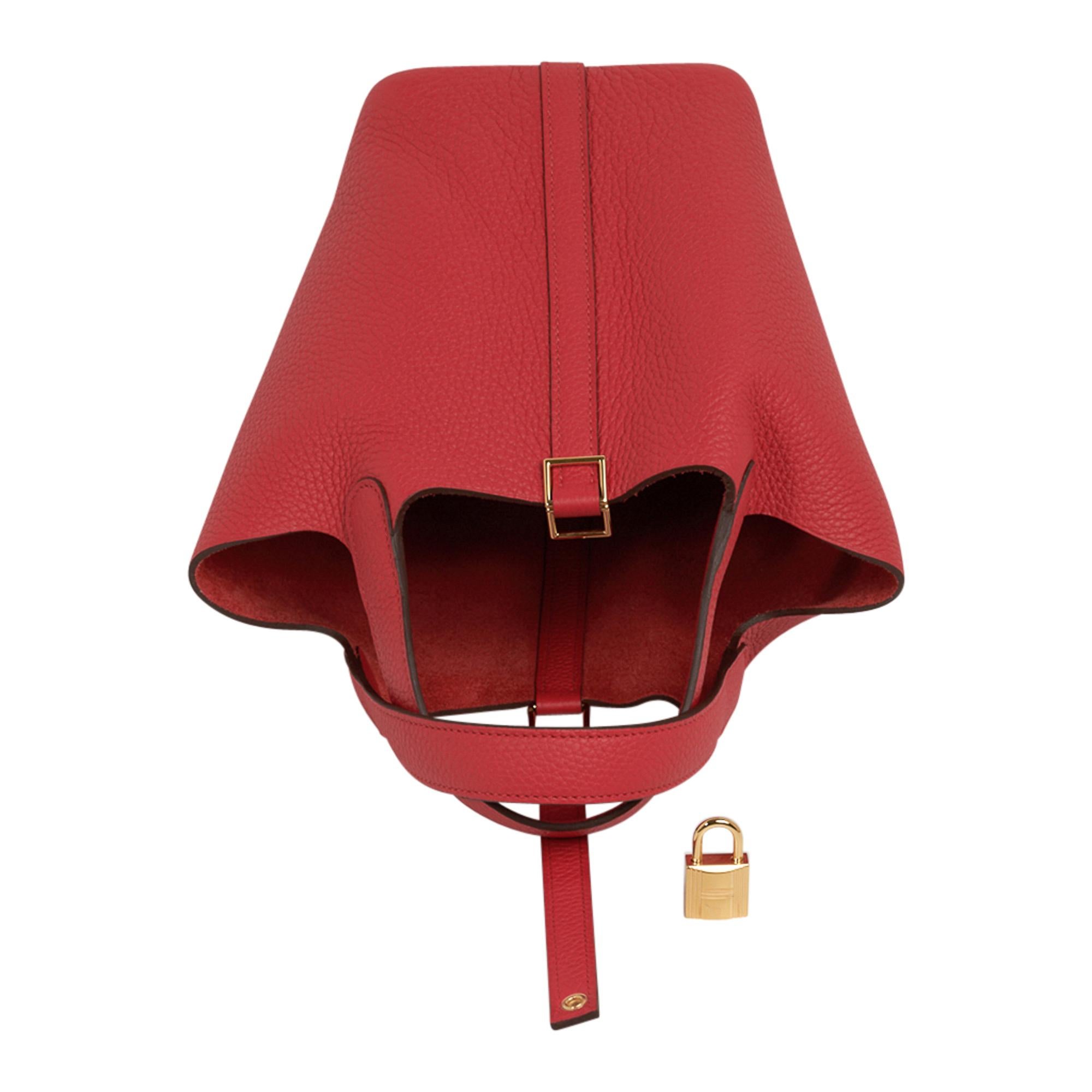 Guaranteed authentic Hermes Picotin Lock 18 tote bag featured in Rouge Tomate.
Clemence leather with Gold hardware.
This roomy small tote is a perfect go to bag! 
Comes with lock and keys, sleeper, and signature Hermes box.
NEW or NEVER WORN
final
