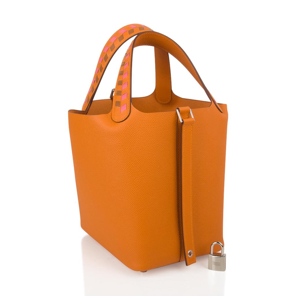 Guaranteed authentic Hermes Picotin Lock 18 tote bag features exquisite Abricot.
Featured in Epsom leather and with Palladium hardware.
This roomy small tote is a perfect go to bag! 
Comes with lock and keys, sleeper, and signature Hermes box.
NEW