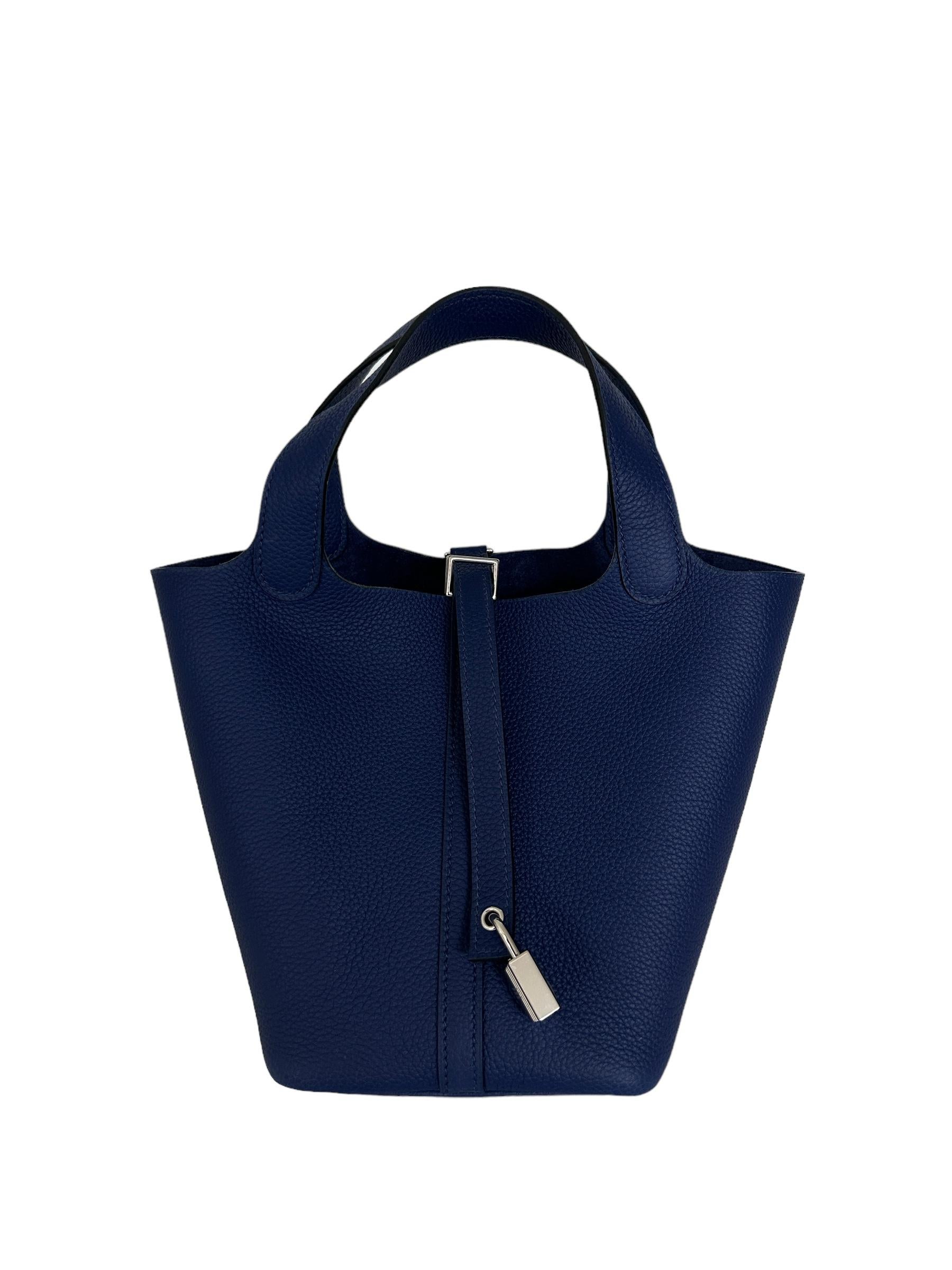 Hermes
Hermes Picotin Lock 18cm of Blue saphire leather with palladium hardware.
So Royal and Chic!
This Picotin Lock features tonal stitching with two top handles and a pull through closure on top.
Dress it up with your favorite scarf or charm, so