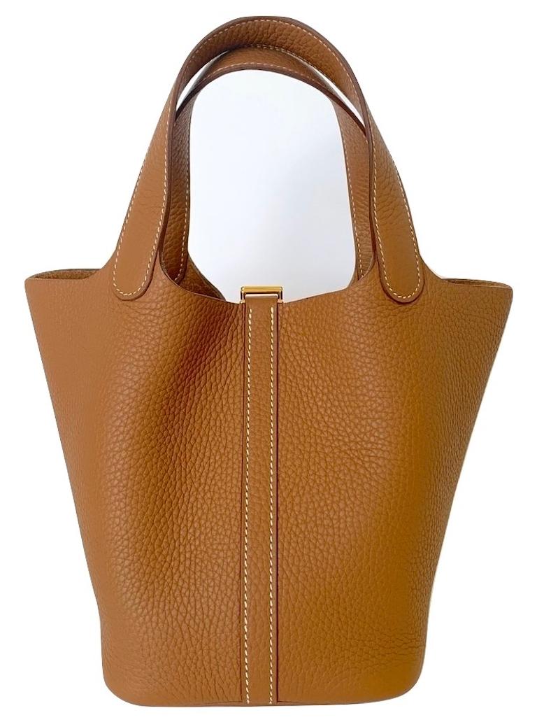 Hermes Picotin Lock
18cm Size
This is the small one, the most wanted size 18cm
Gold Clemence with Gold Hardware
Timeless
Its lining-less, clean-cut leather and plain, flexible handles make it the ultimate bag
Bag in taurillon Clemence leather with