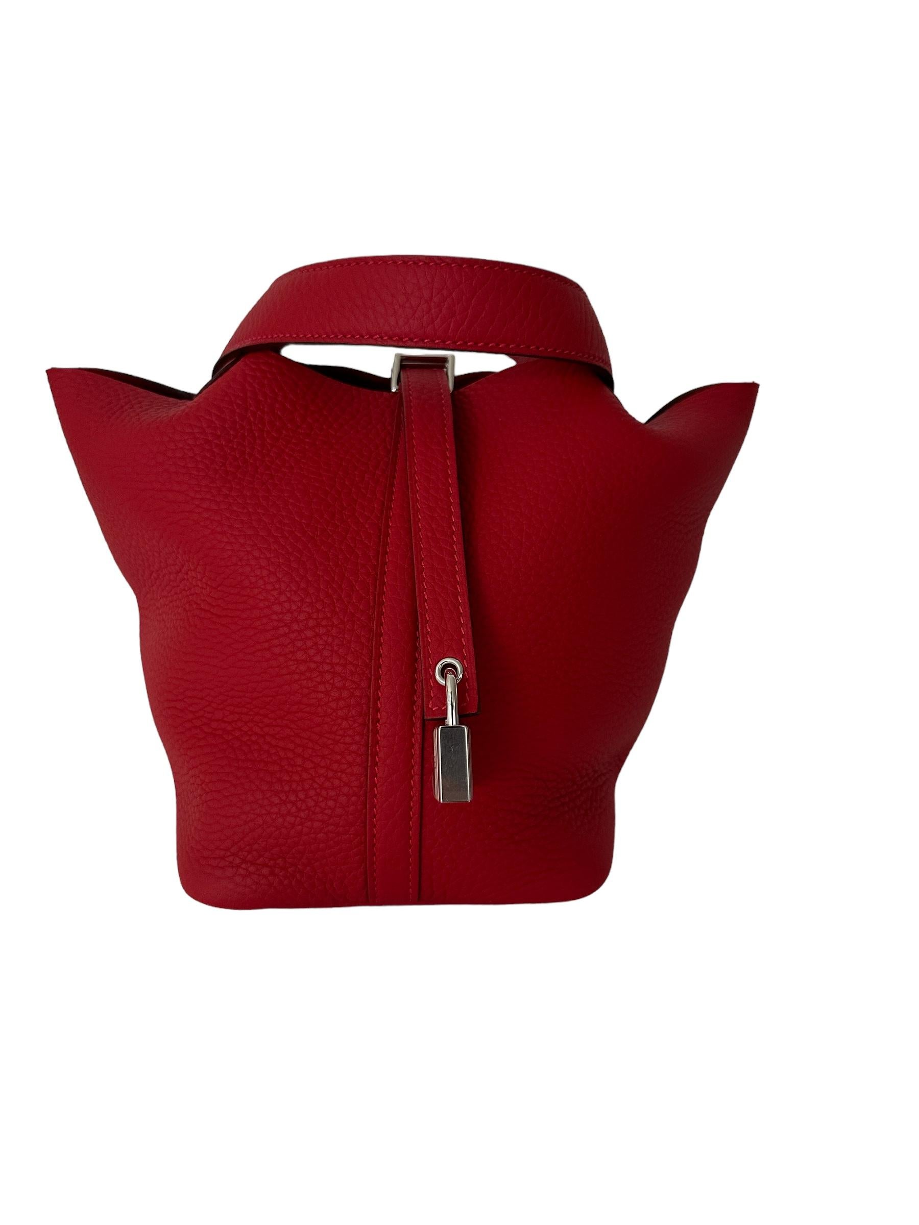 Hermes
Hermes Picotin Lock 18cm of Rouge Vermillion clemence leather with palladium hardware.
Vermillion is a tried and true red Hermes offers
Its a Lipstick Red
Just gorgeous
This Picotin Lock features tonal stitching with two top handles and a