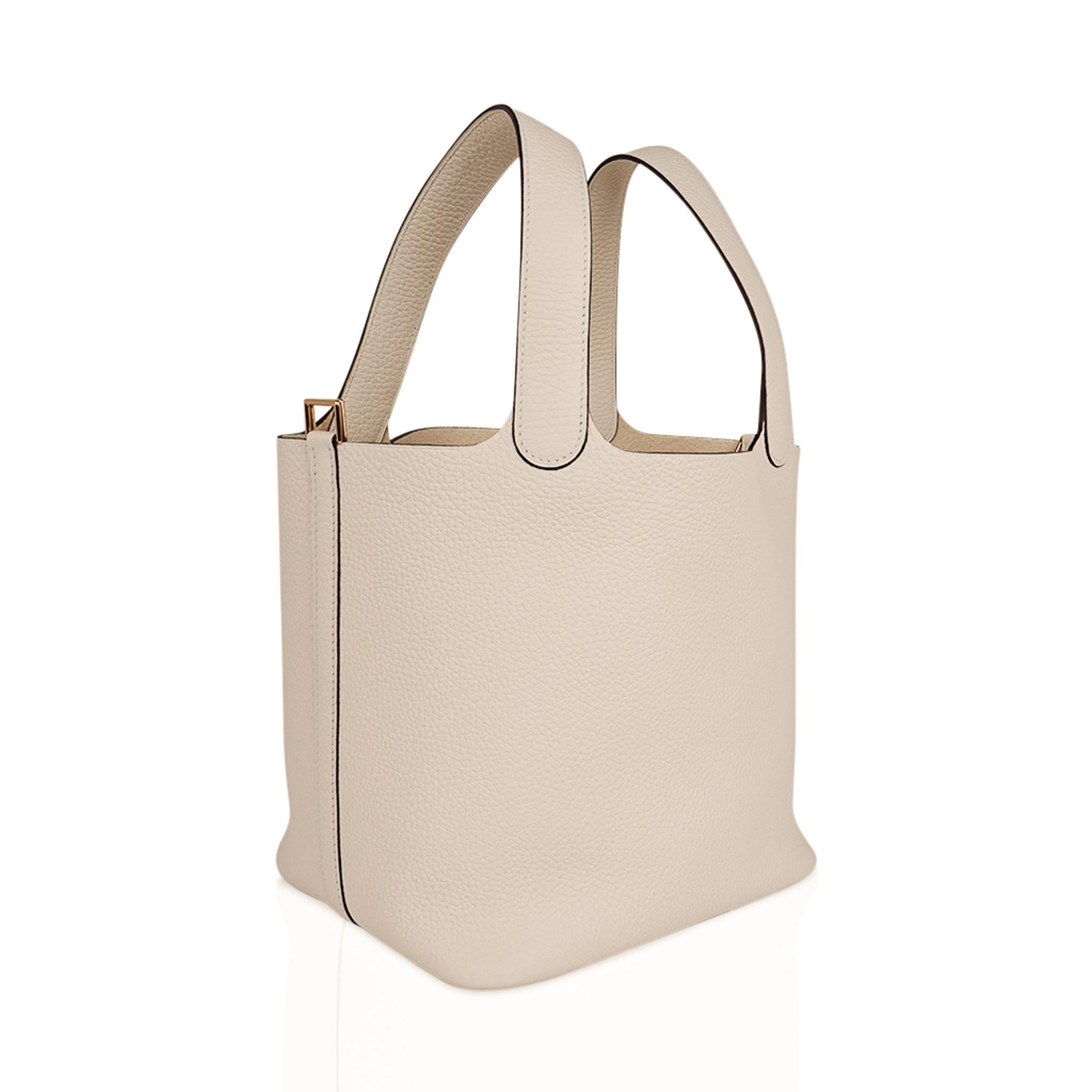 Mightychic offers an Hermes Picotin Lock 22 bag featured in fabulous chalk white neutral Nata.
Rich with gold hardware.
This roomy tote is a perfect go to bag!
Comes with Signature Hermes box, lock, keys and sleeper.
NEW or NEVER WORN
final
