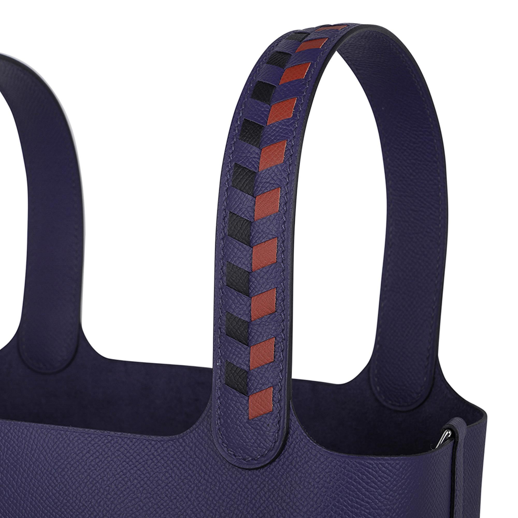 Mightychic offers a limited edition Hermes Picotin Lock 22 Tressage featured in Blue Encre.
Brique and Noir accentuates the handles.
Epsom leather and Palladium hardware.
This roomy small tote is a perfect go to bag!
Comes with lock, keys, sleeper