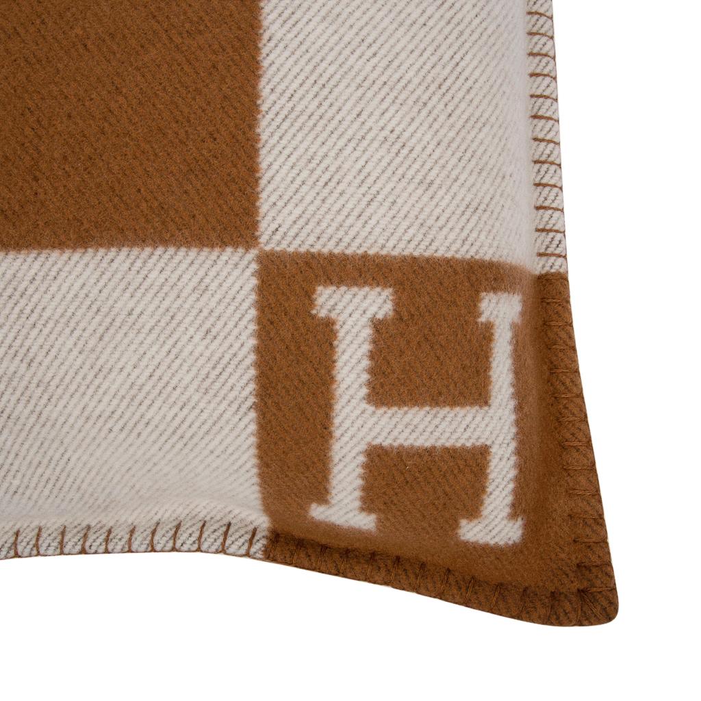 Guaranteed authentic Hermes classic Small Model Avalon signature H pillow in Camel and Ecru.
The removable cover is created from 90% Wool and 10% cashmere and has whip stitch edges.
Comes with sleeper.  
*This listing is for one pillow only*
Please